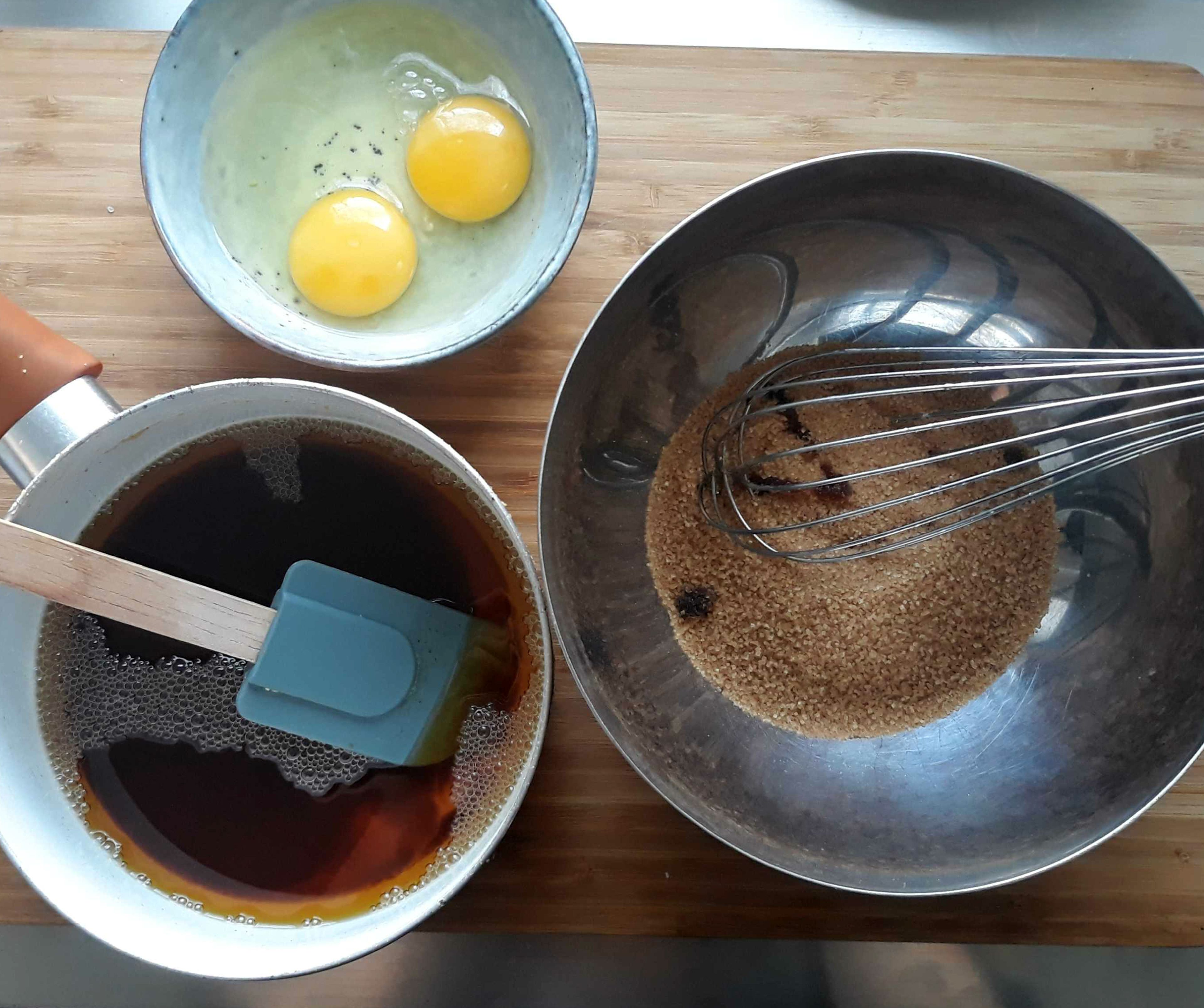 Melt and brown butter in a saucepan or small frying pan. Pour brown butter over raw sugar, then mix thoroughly. Add vanilla extract and eggs and stir to combine.