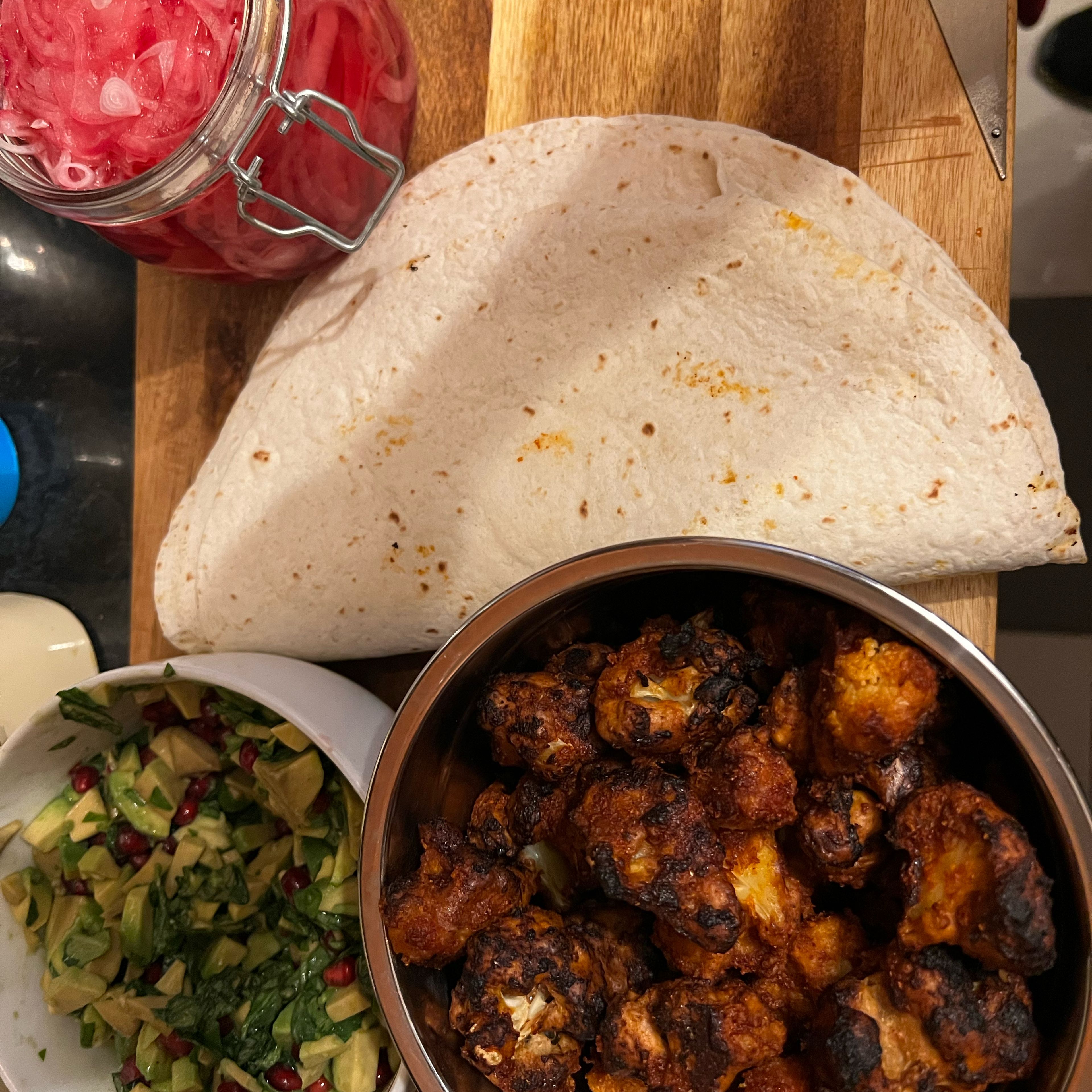 Buffalo Cauliflower Wing Tacos with Pickled Onions