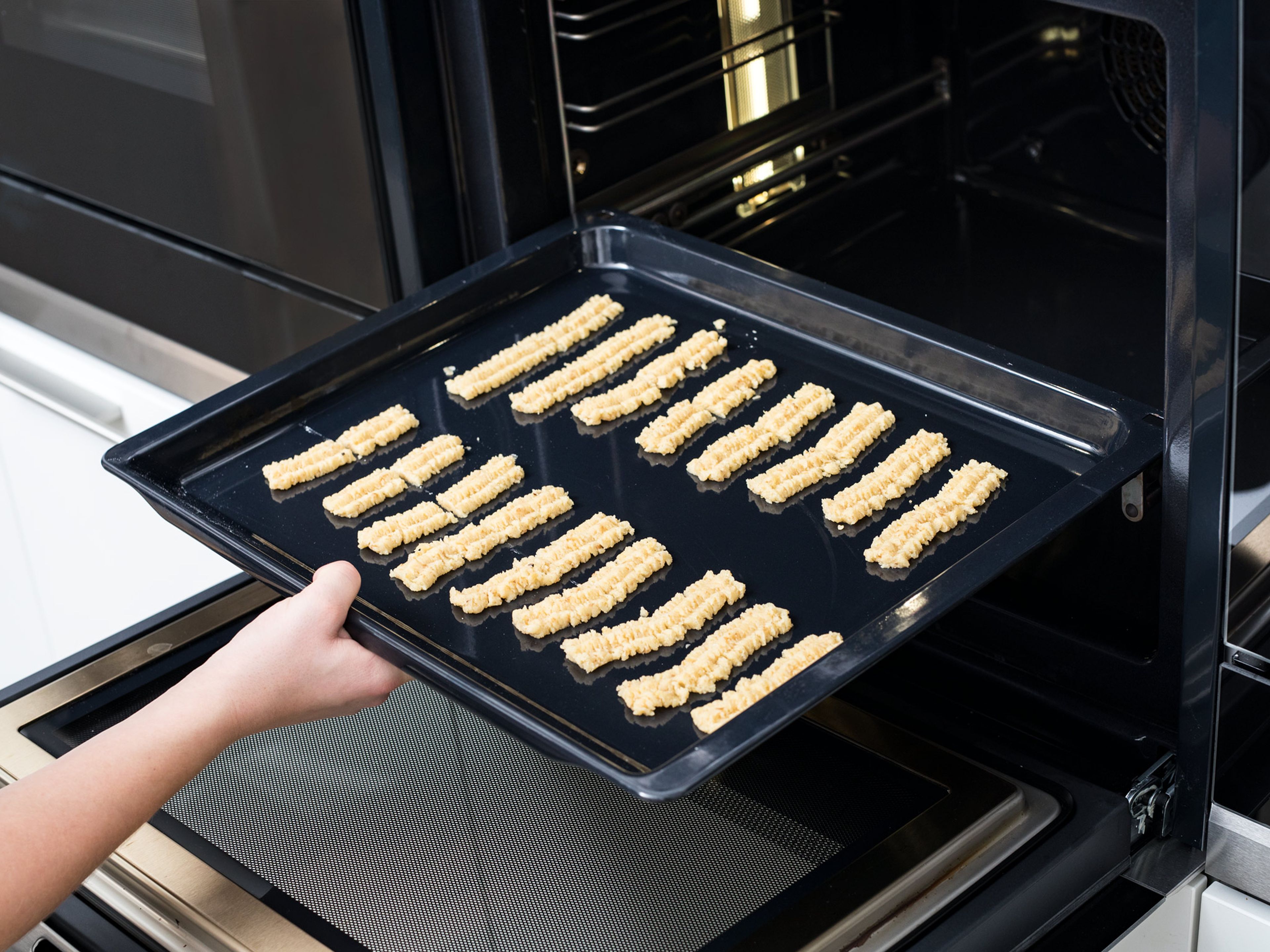 Transfer cookies to a baking sheet, leaving at least 1-cm/0.4-in. space between each cookie. Cut to size if needed. Transfer to oven and bake at 180°C/350°F for approx. 12 – 15 min. then let cool completely.