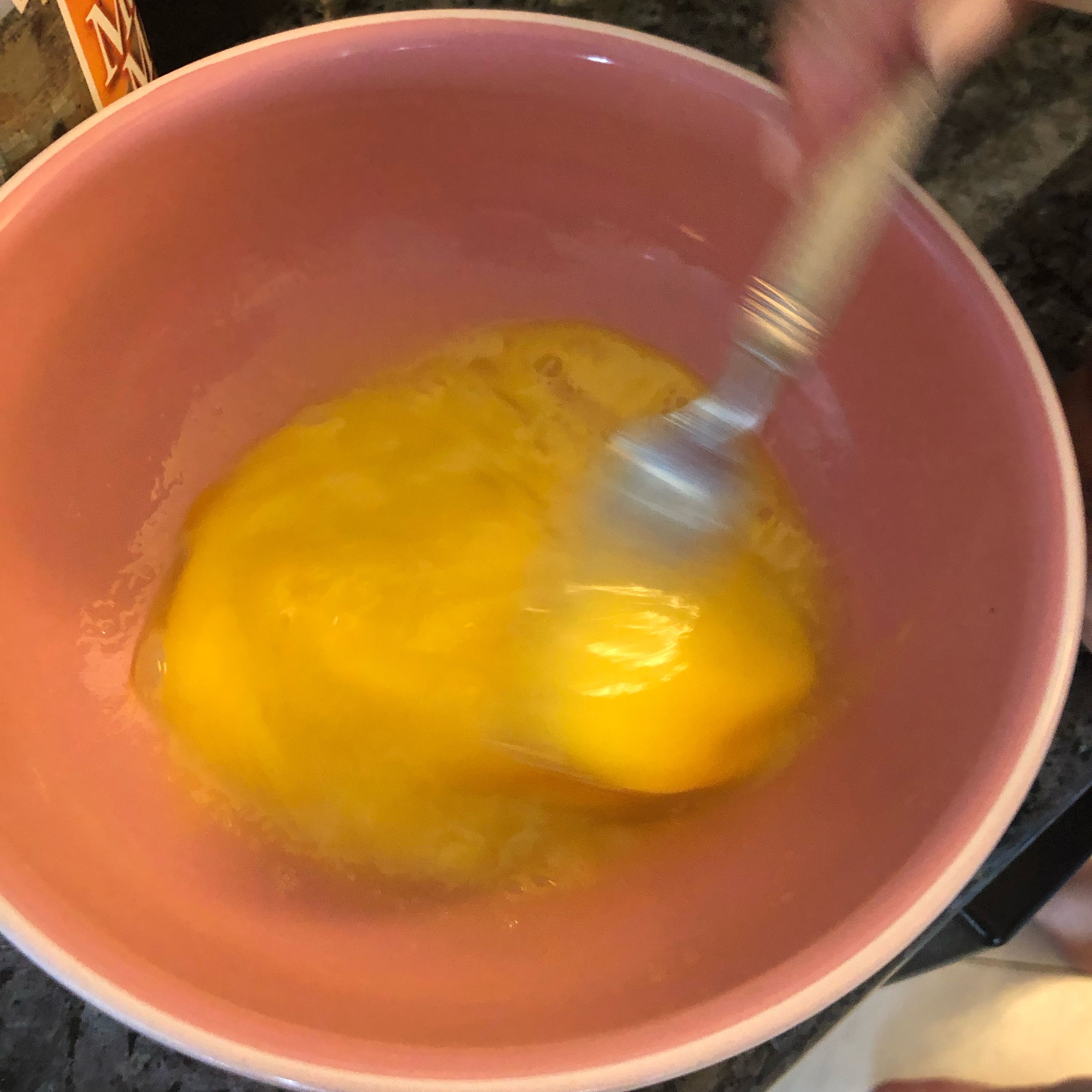 Beat 2 eggs into a bowl