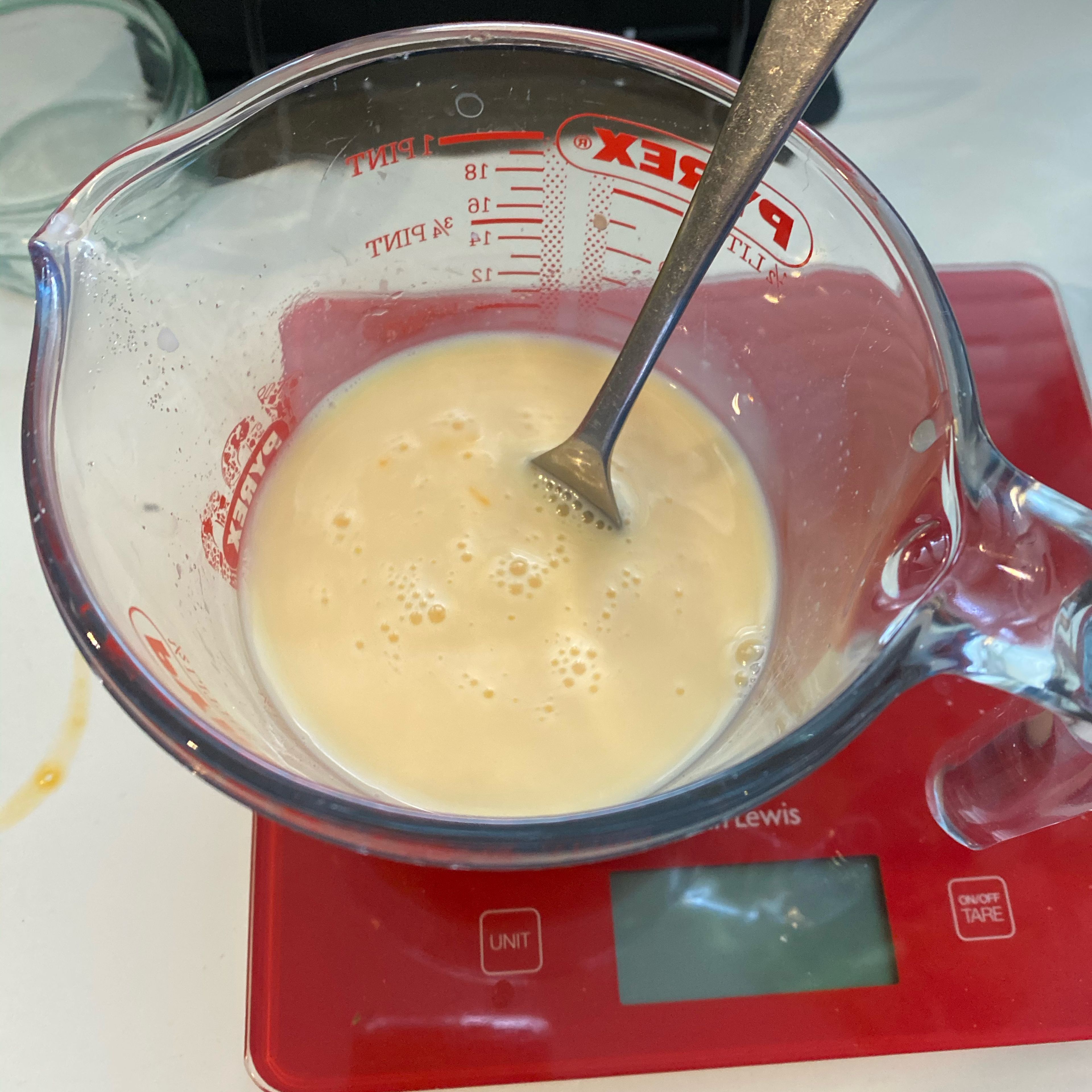 In a jug, mix the milk, 1 half of the egg mixture, caster sugar and the vanilla extract.