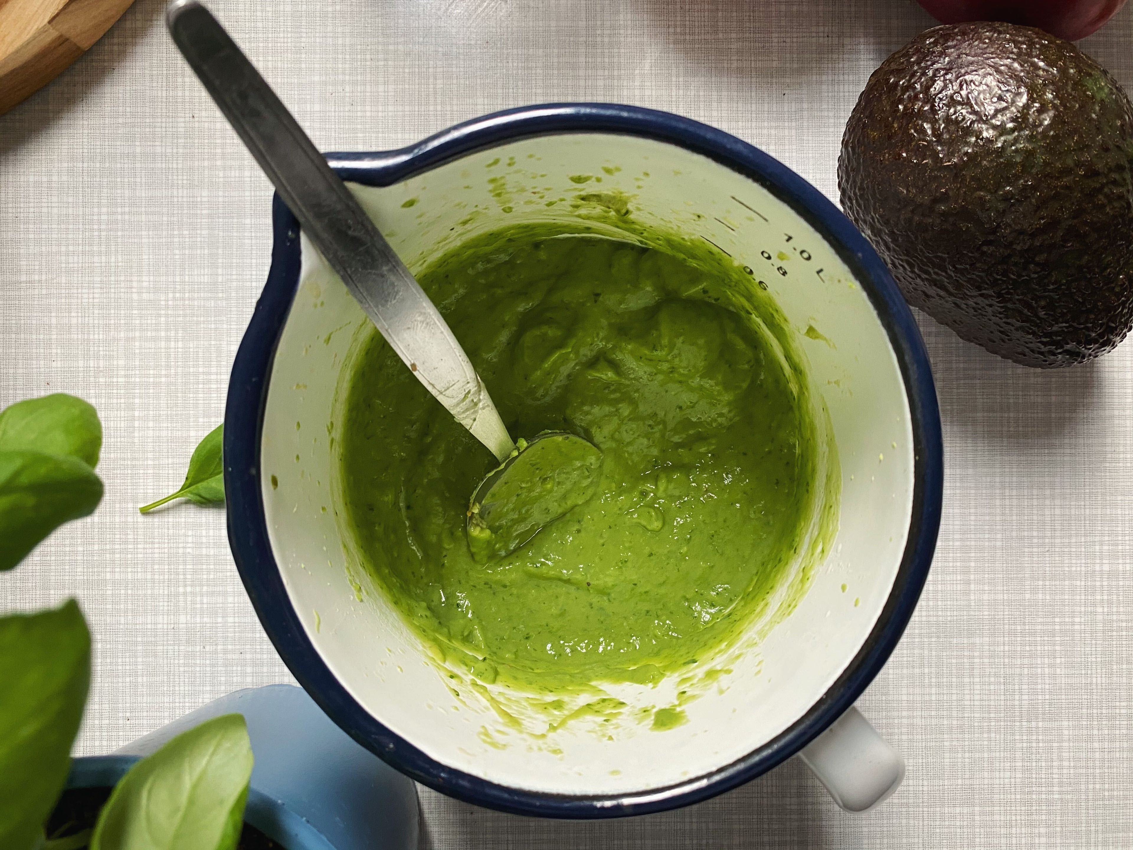 For the dressing, halve and pit avocado. Add the pulp, basil, olive oil, lime juice, and reserved pasta water to a large measuring cup. Use an immersion blender to blend until smooth. Season with salt and pepper to taste.