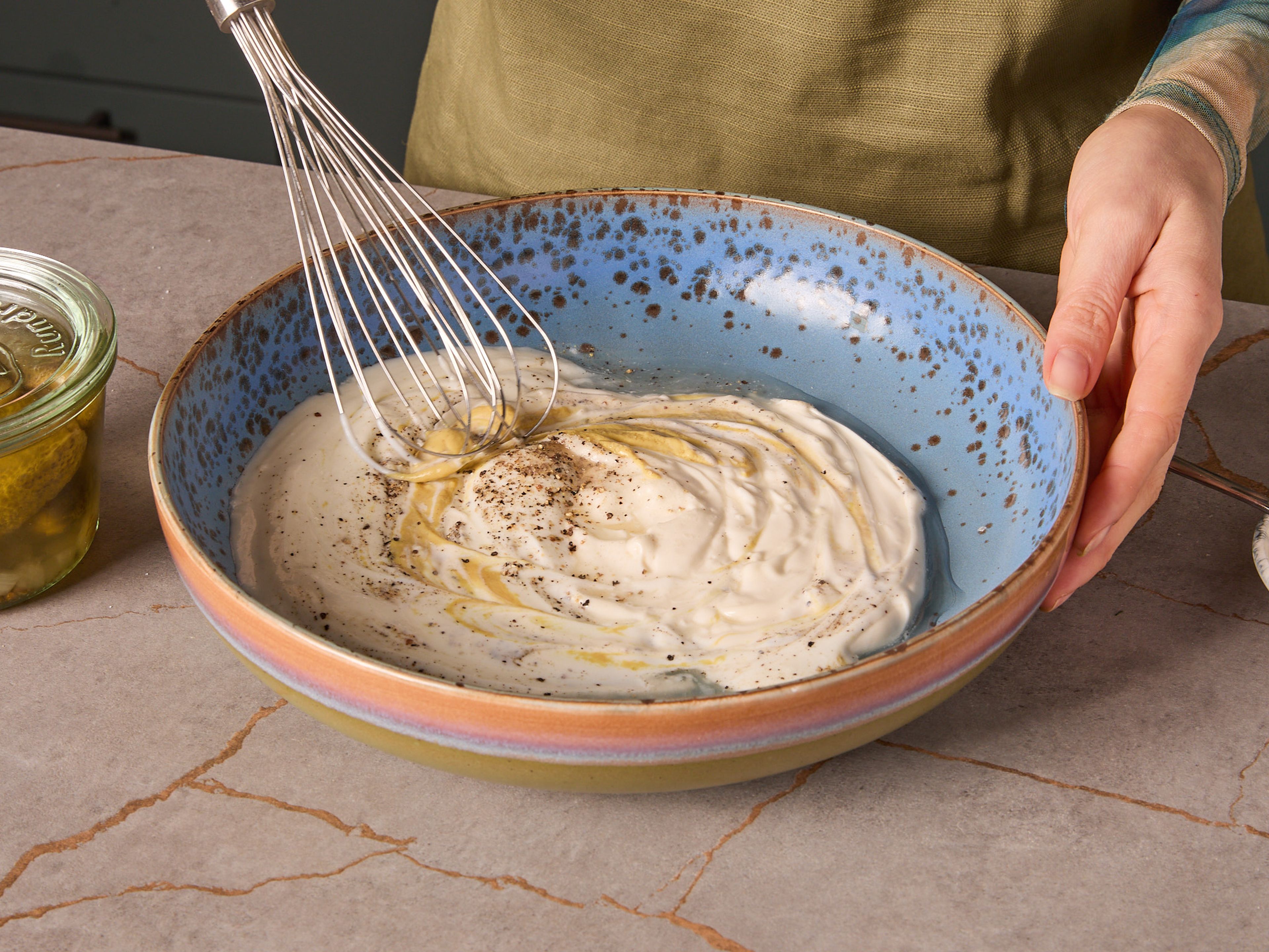 In a large bowl, mix together mayonnaise, yogurt, pickle juice, mustard and sugar to make a smooth dressing. Season to taste with salt and pepper.