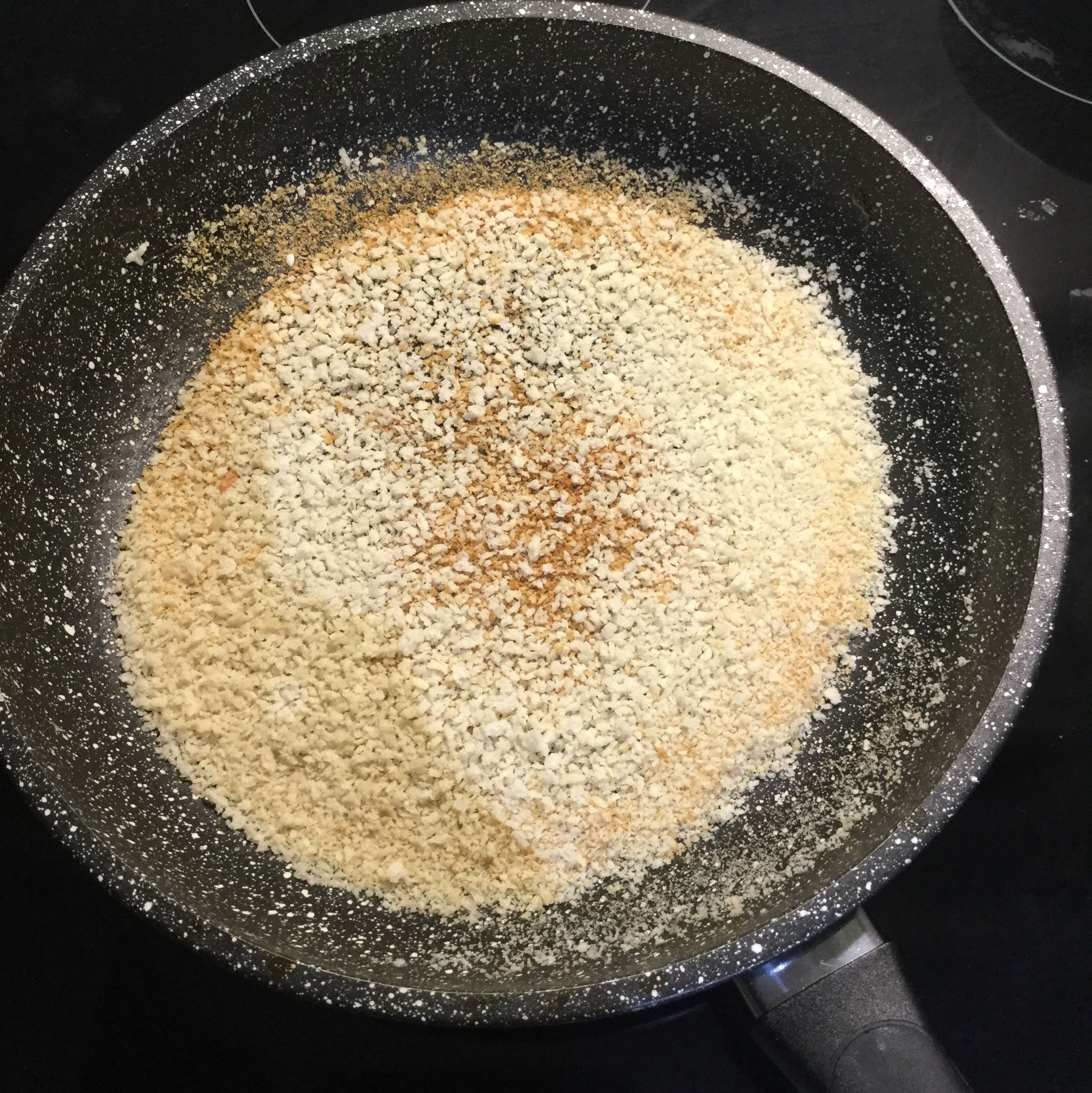 In the meantime, prepare the panko breadcrumbs. Add to frying pan, cook and stir until golden brown.