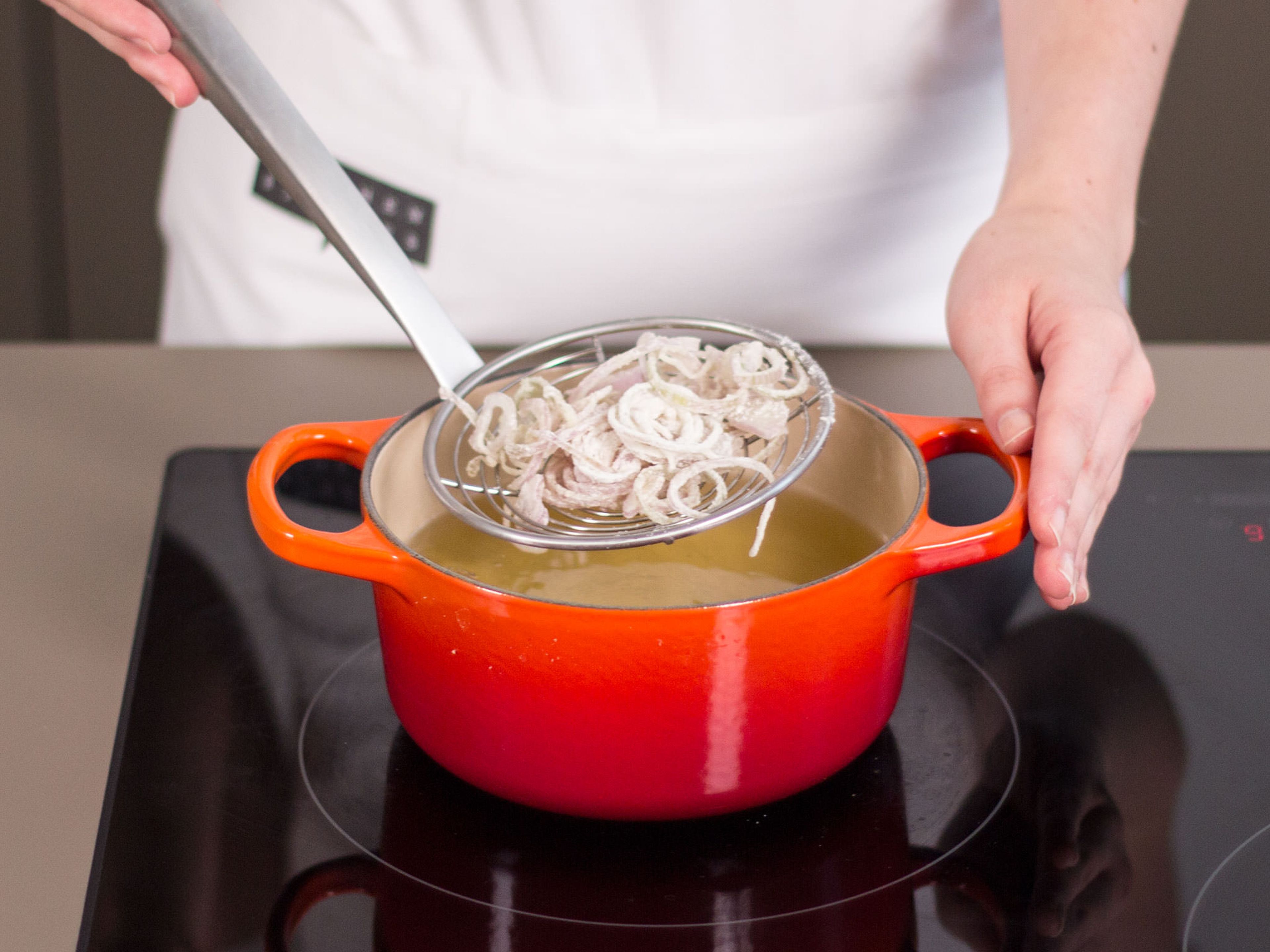 Let casserole heat through fully in pan and adjust seasoning if needed. Transfer the mixture to a serving dish. Garnish with the fried shallots and optionally with fresh summer savory before serving.