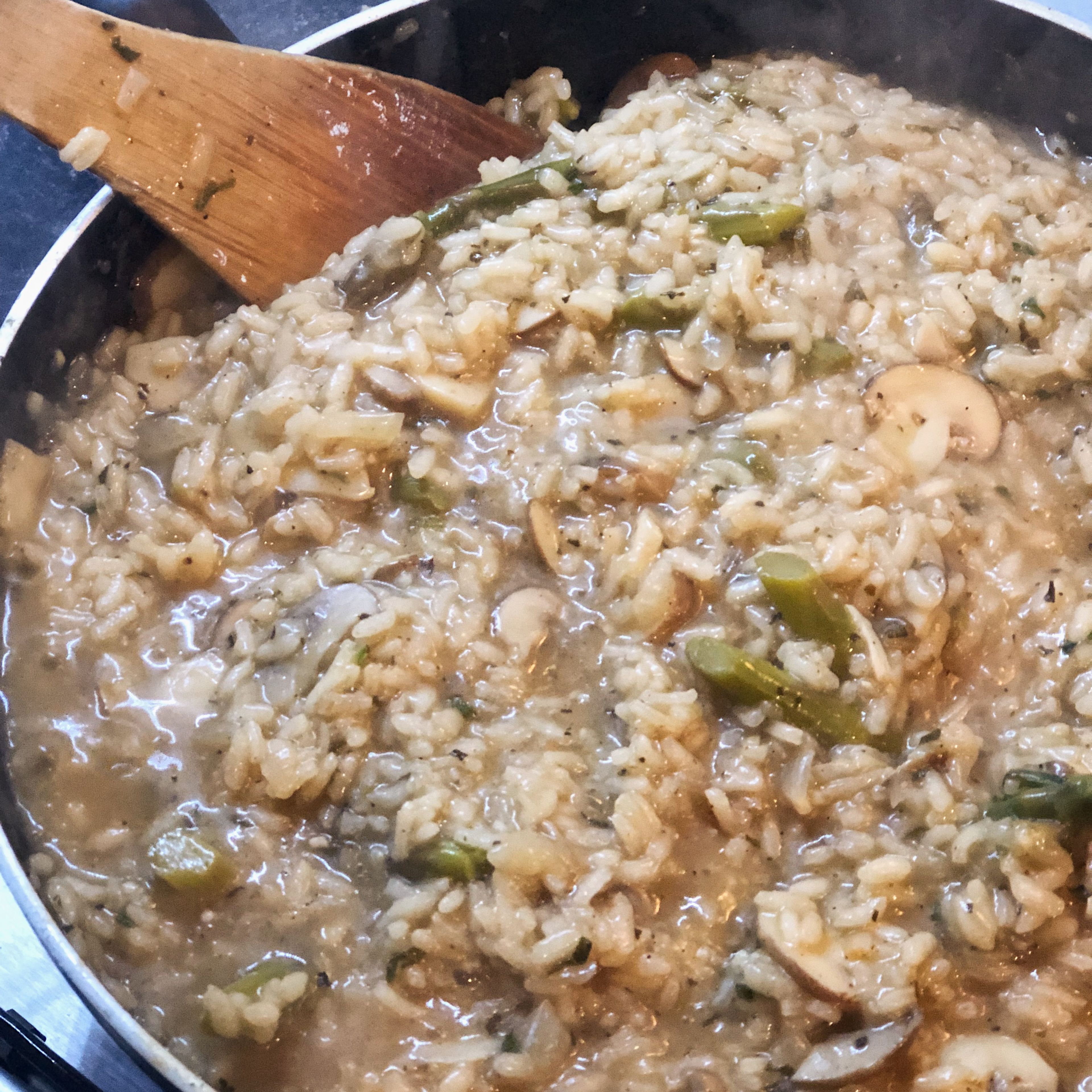 Add sage to the wok. Now add stock bit by bit for 25 minutes or until rice is soft and creamy . Let the rice absorb the stock before adding more.