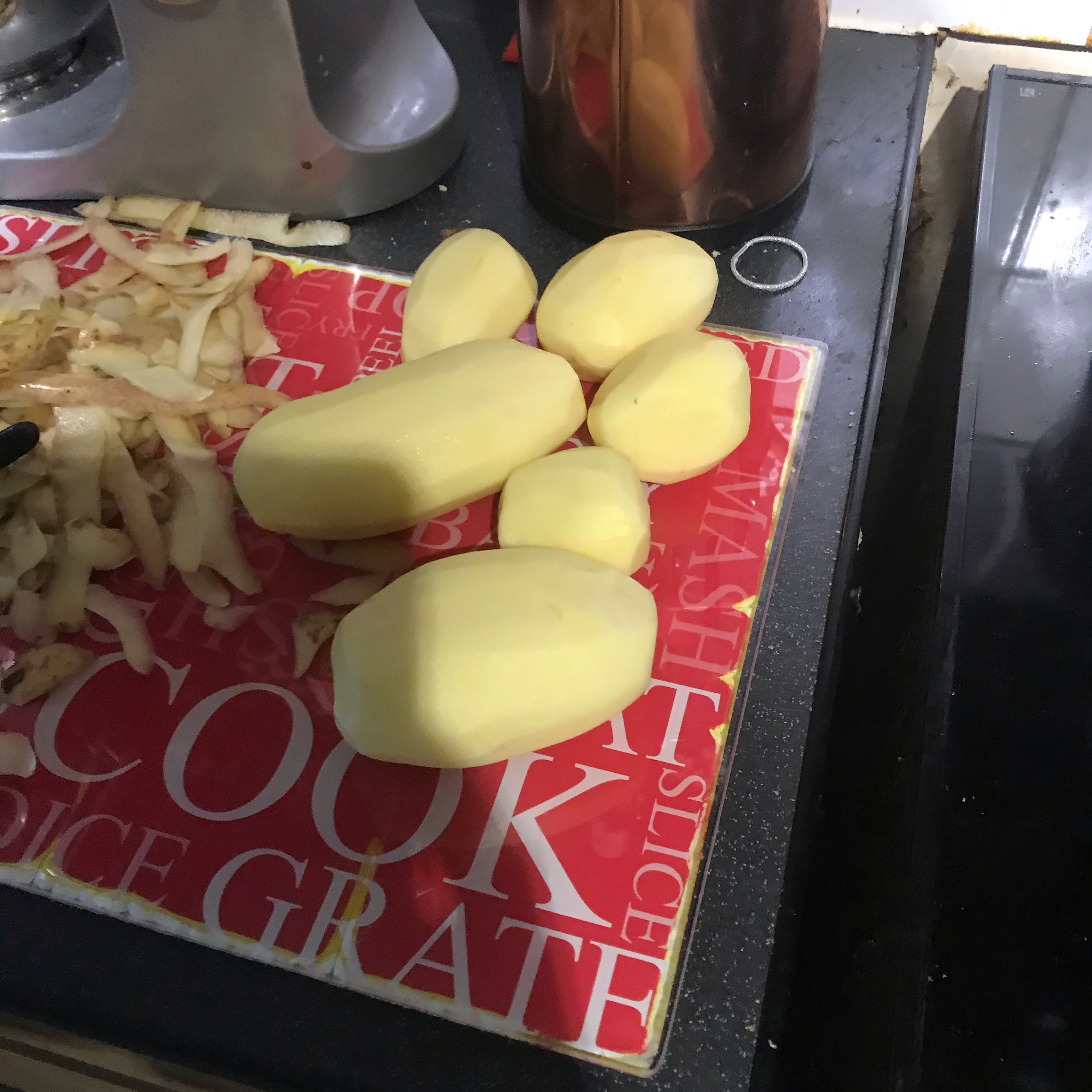 Peel and dice 6-8 potatoes into 1 inch cube