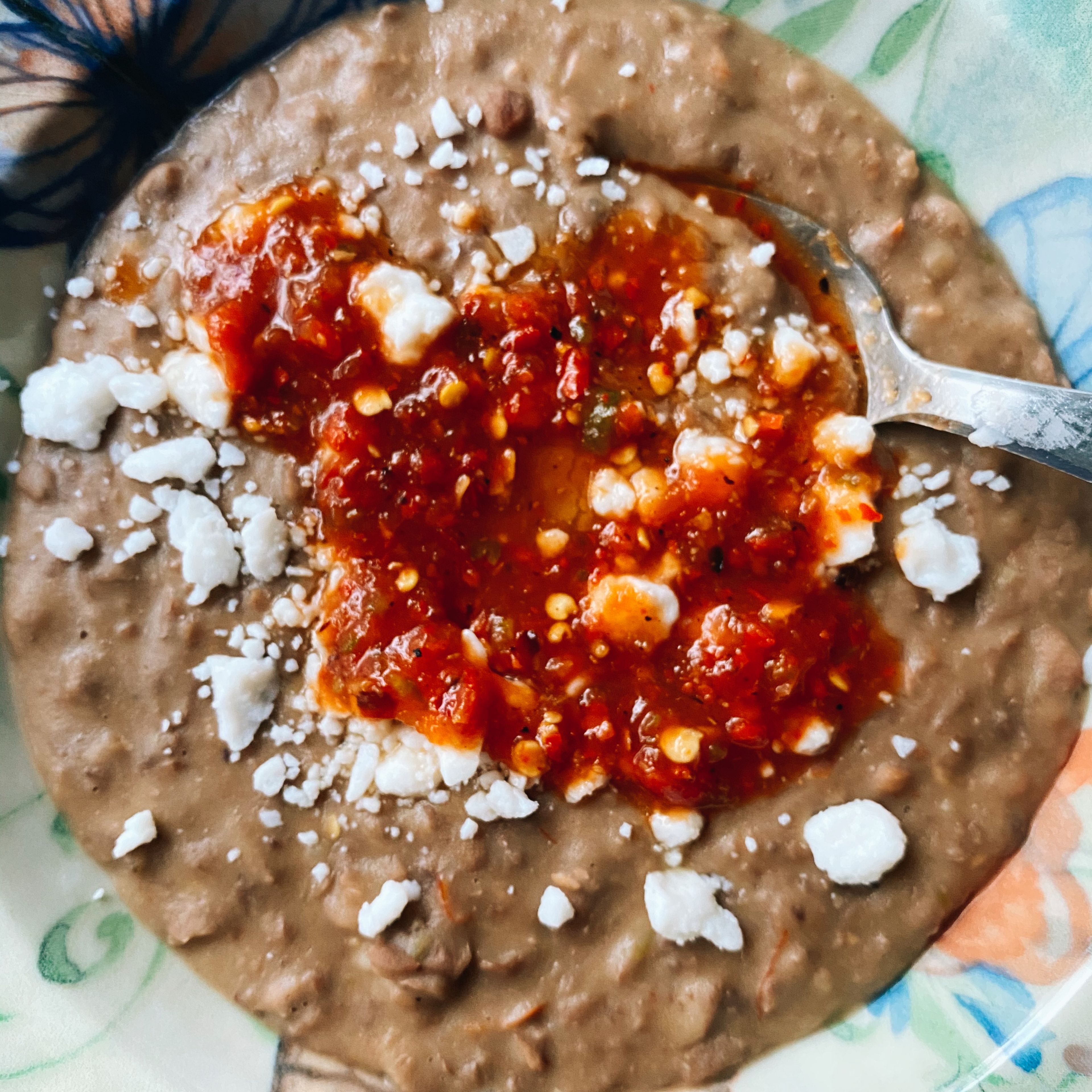 That’s it. Serve your fried beans with queso fresco(I used the feta style from follow your heart) and hot fresh salsa!