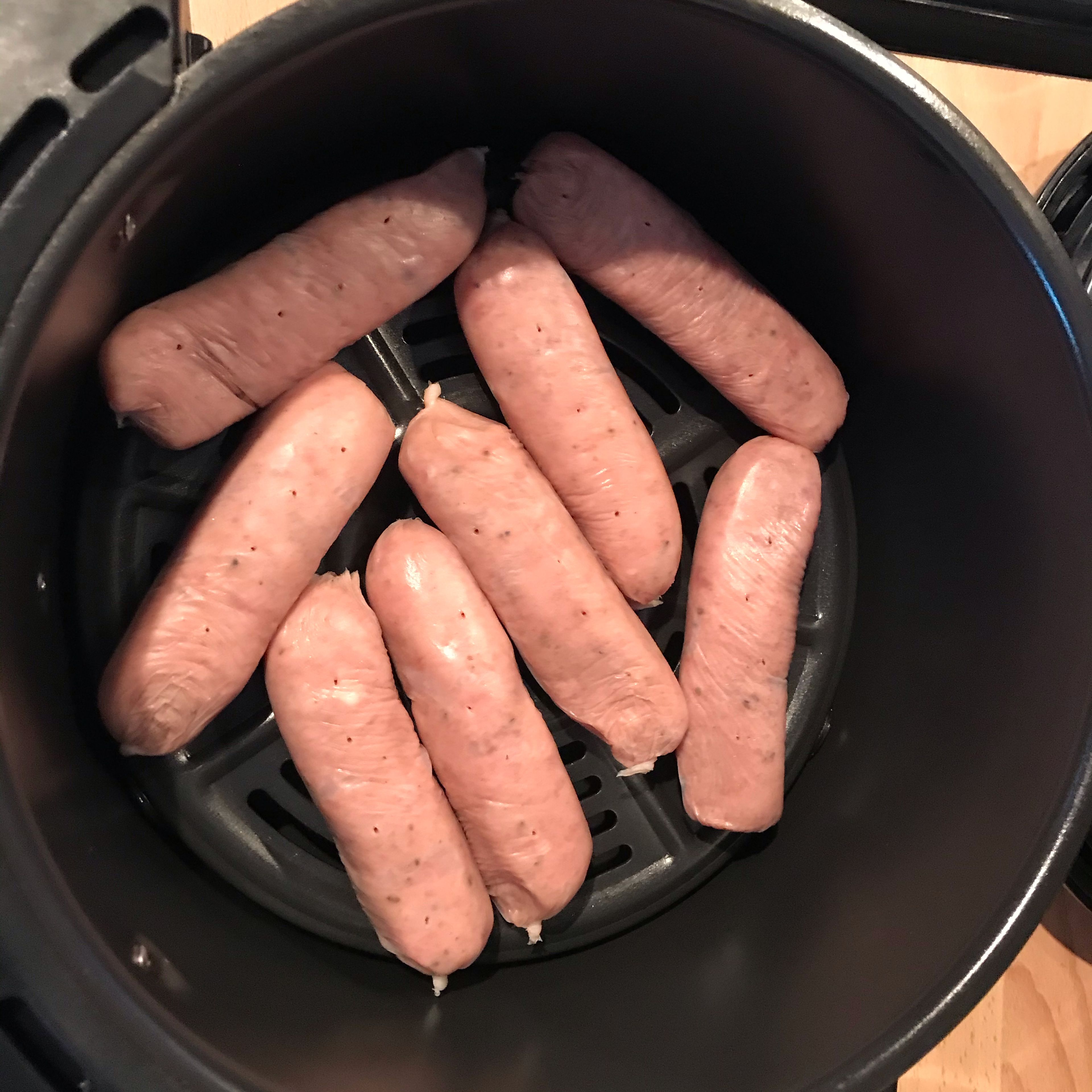 Pierce sausages then air fry for 10 minutes. Remember to toss the sausages in a pan every few minutes .