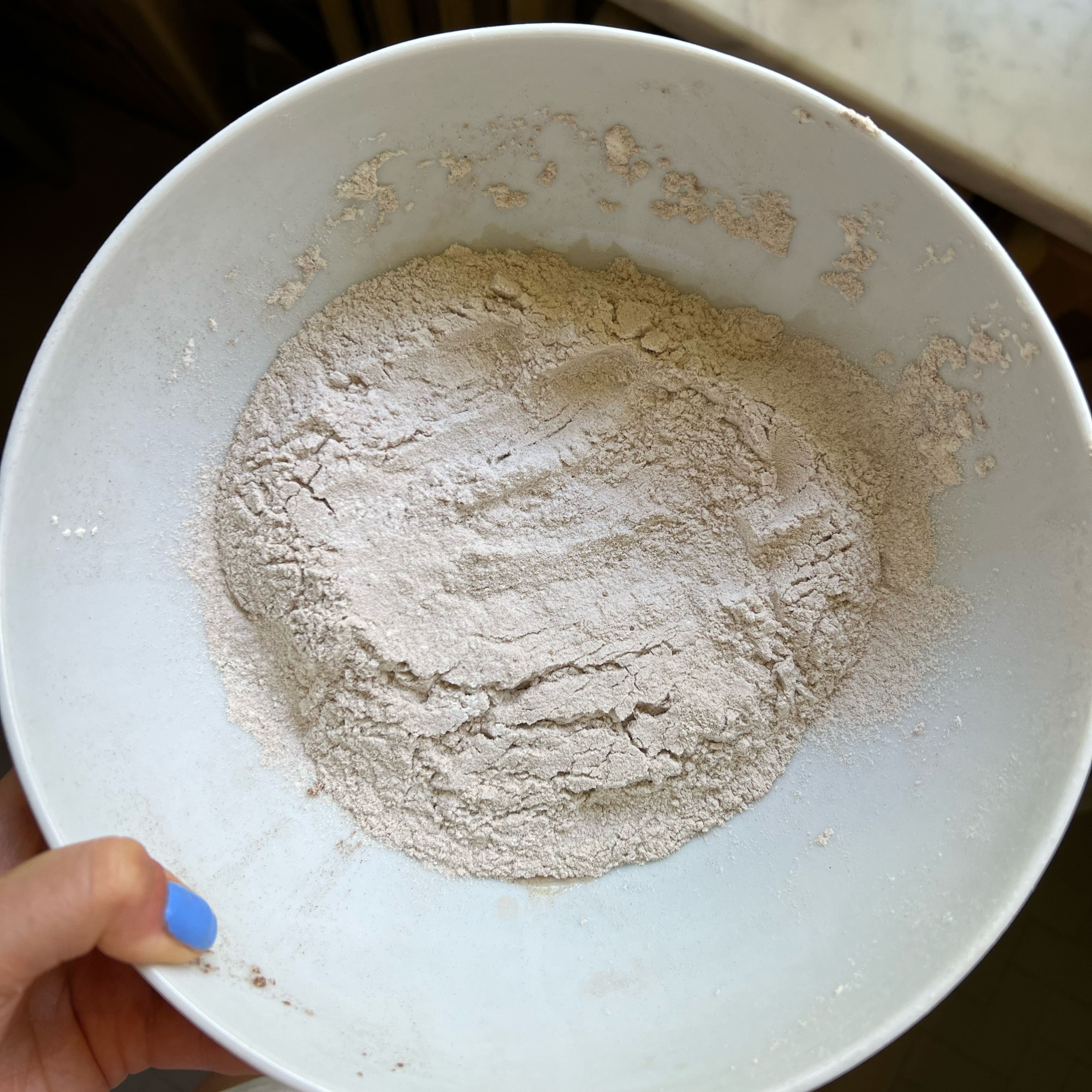 To make dry mixture you'll need to whisk and sift all-purpose flour, baking powder, salt and all the spices (cinnamon, cardamon, nutmeg) until they are well blended. 
