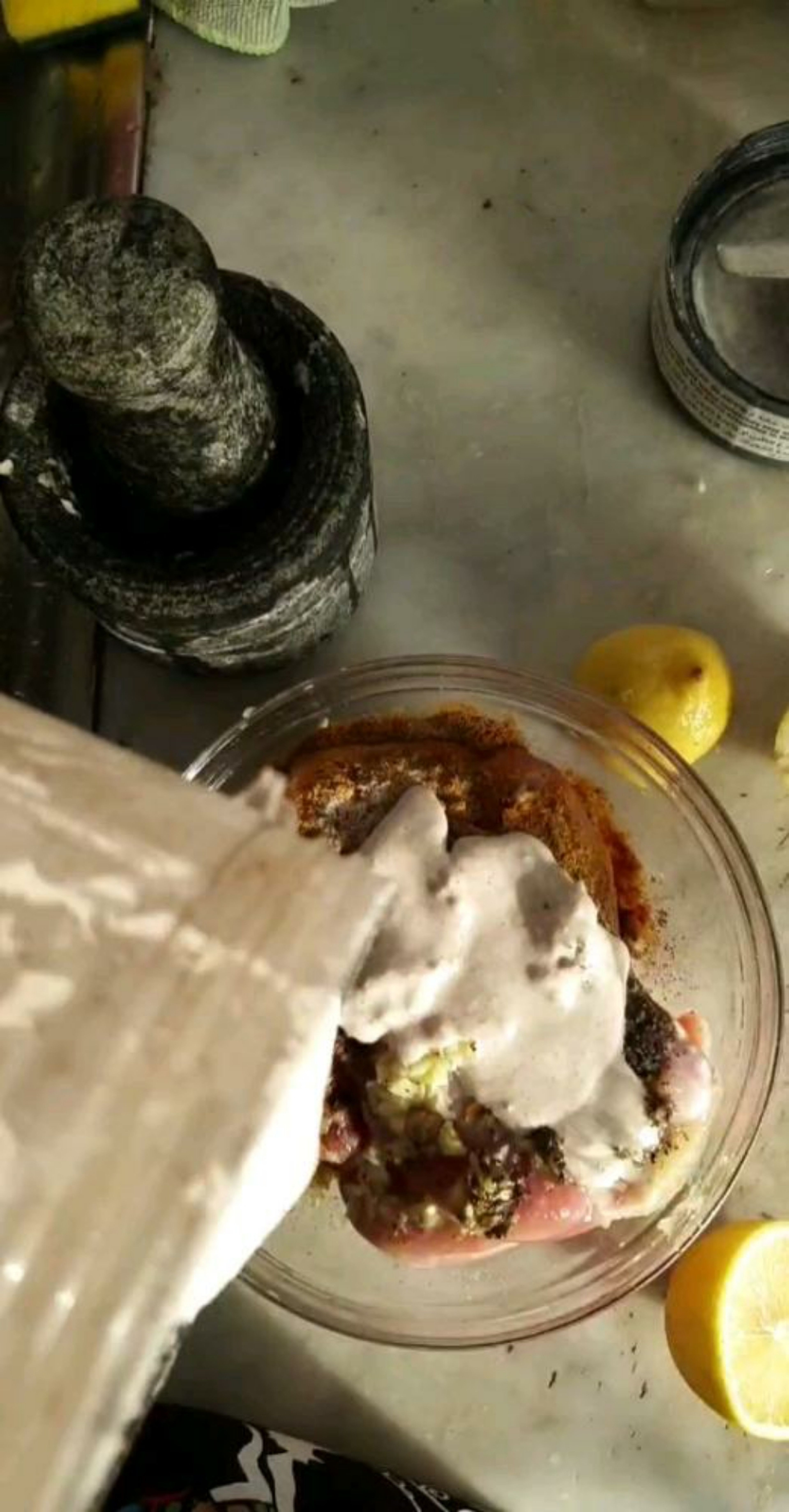 Blanch almonds and cashews for 10-15 minutes. Let them cool and grind it to a thick paste. Add the paste to the chicken.