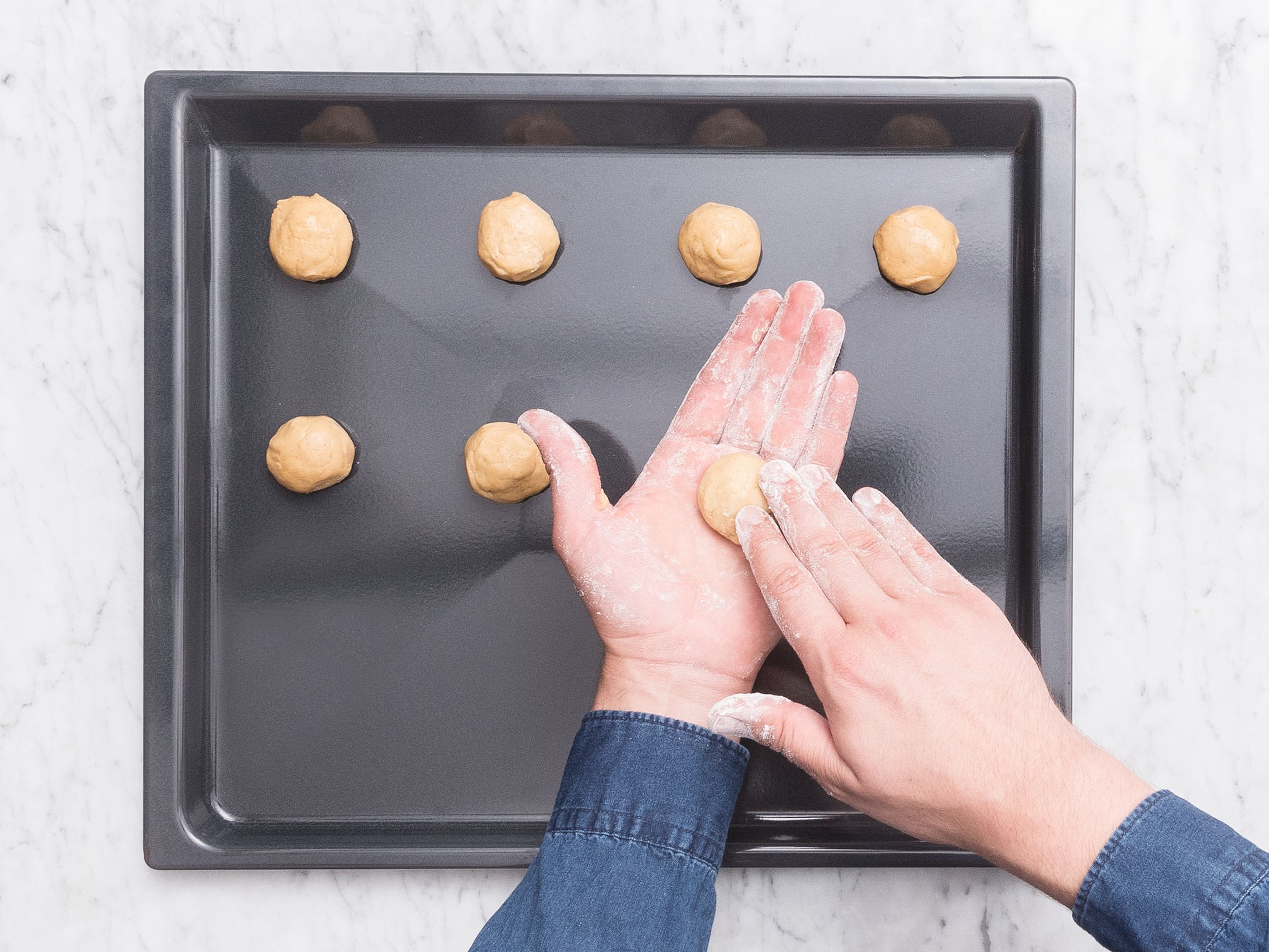 Use a tablespoon to measure out the cookies, roll into a smooth ball, and place on a lined baking sheet. Bake at 180°C/350°F for approx. 10 min. Remove from oven and let cool slightly before transferring to a wire rack.