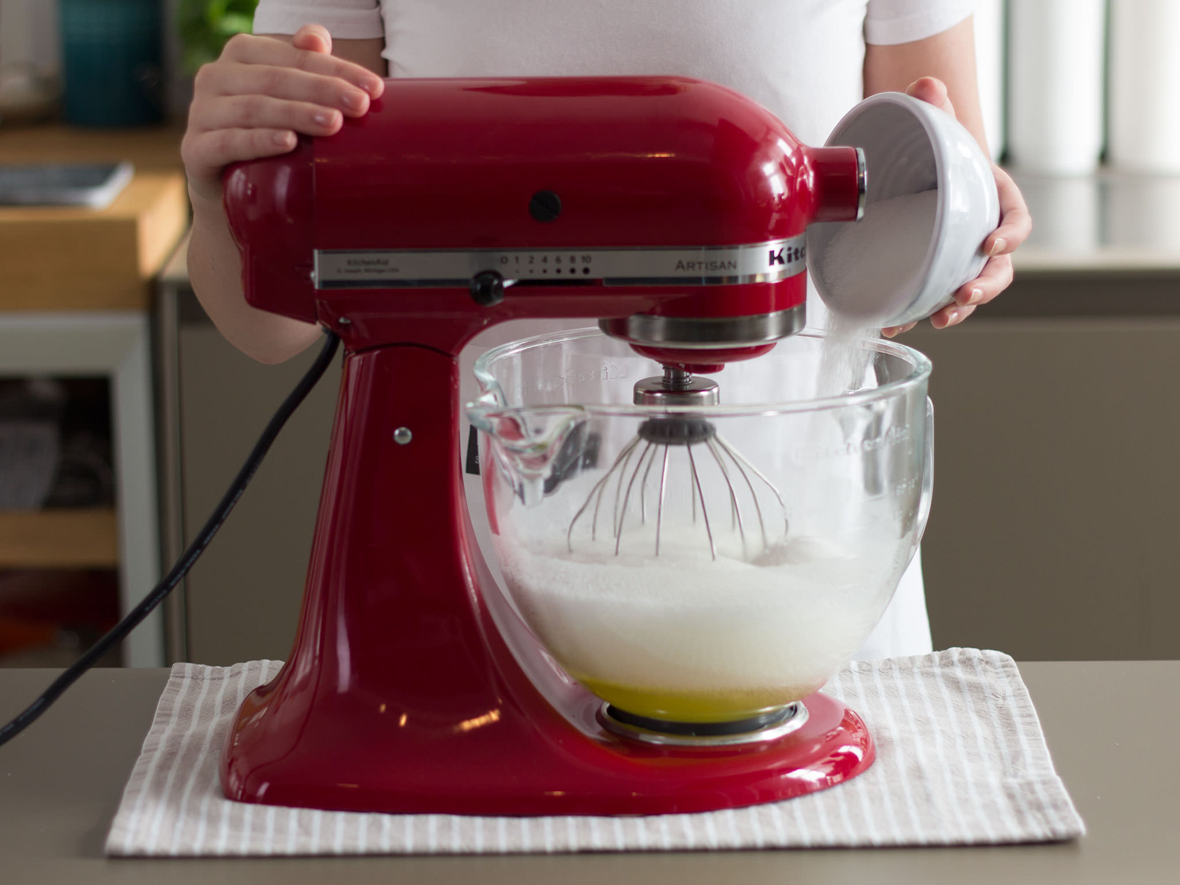 Preheat oven to 180°C/350°F. Separate egg yolks from egg whites. In a stand mixer bowl, beat together sugar and egg whites, for approx. 3 – 5 min., until stiff peaks form.