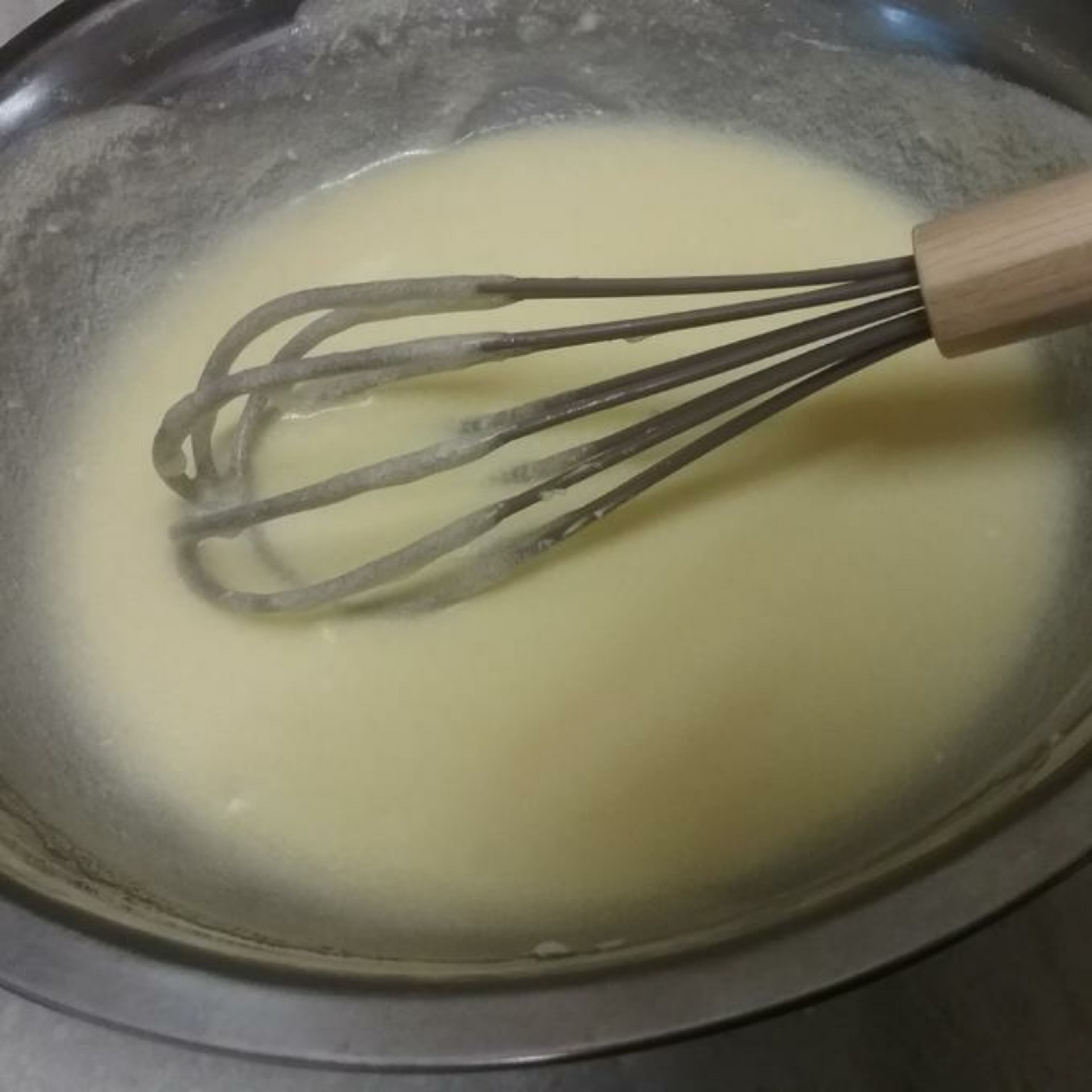 Take another bowl and start mixing the sugar, butter, lemon juice, egg, and vanilla essence.