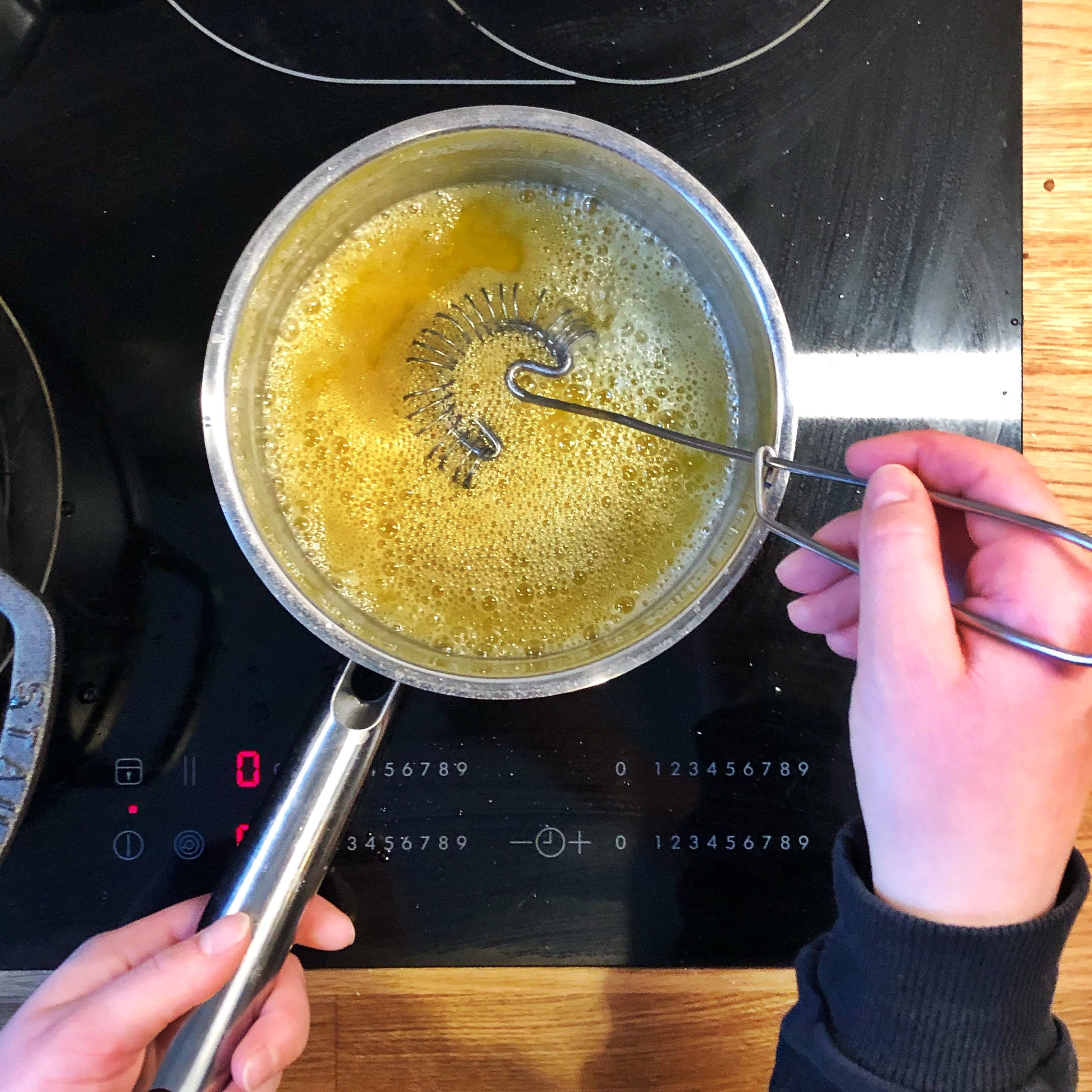 Melt butter in a small pot and bring to a "boil." While constantly whisking, let it simmer and splutter until the butter smells nutty and is light brown in color. Transfer to a bowl to stop the cooking process, and let the butter cool down to room temperature.