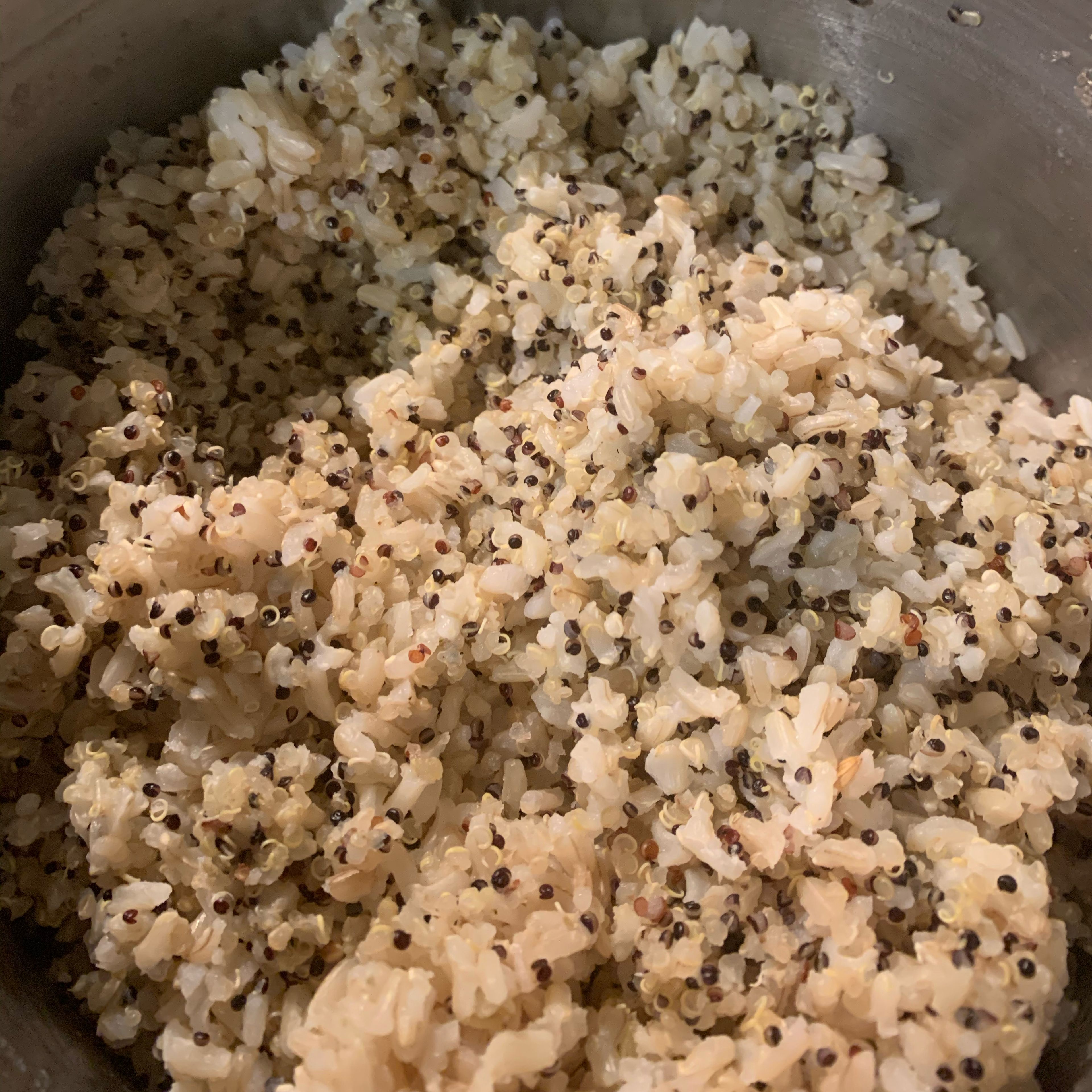 Prepare and cook brown rice (I added in some quinoa for protein, but that’s optional) and go ahead and start to heat up the black beans on the stove on low heat.