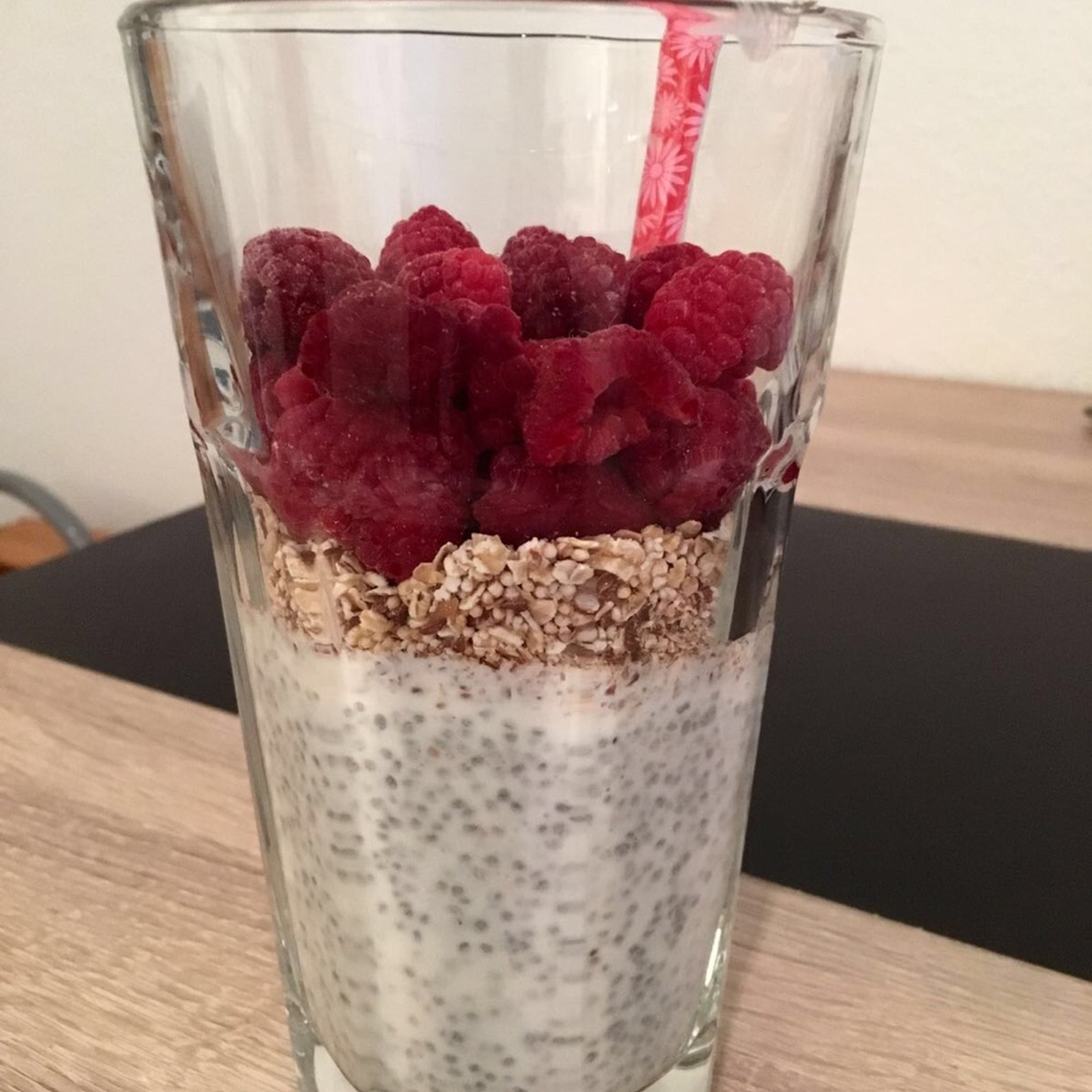 Add frozen raspberries on top, or other berries of choice, but it’s best to use frozen ones as they help the rolled oats to soak in.