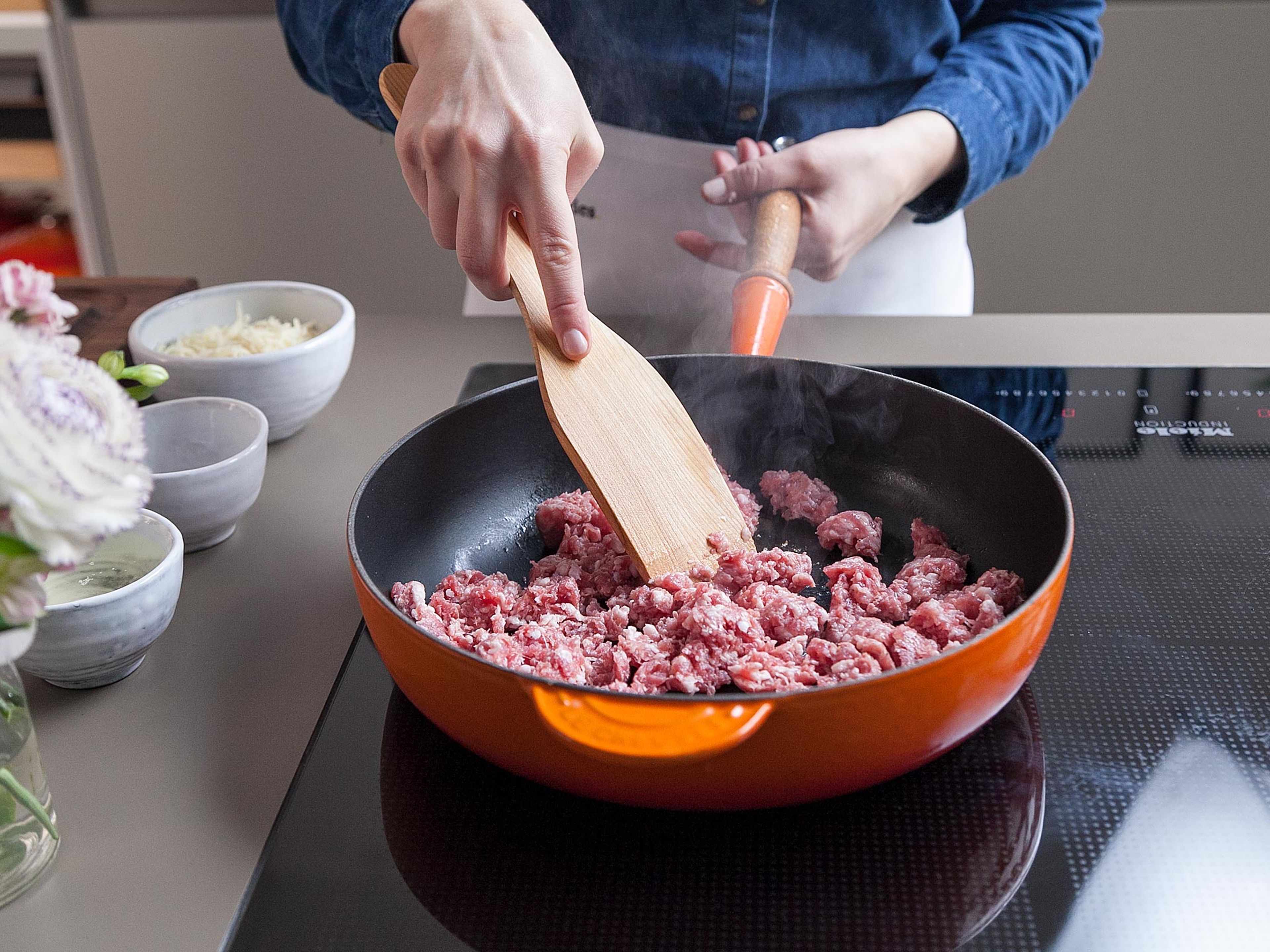 Cook sausage in large frying pan over medium-high heat, stirring frequently, until no longer pink.