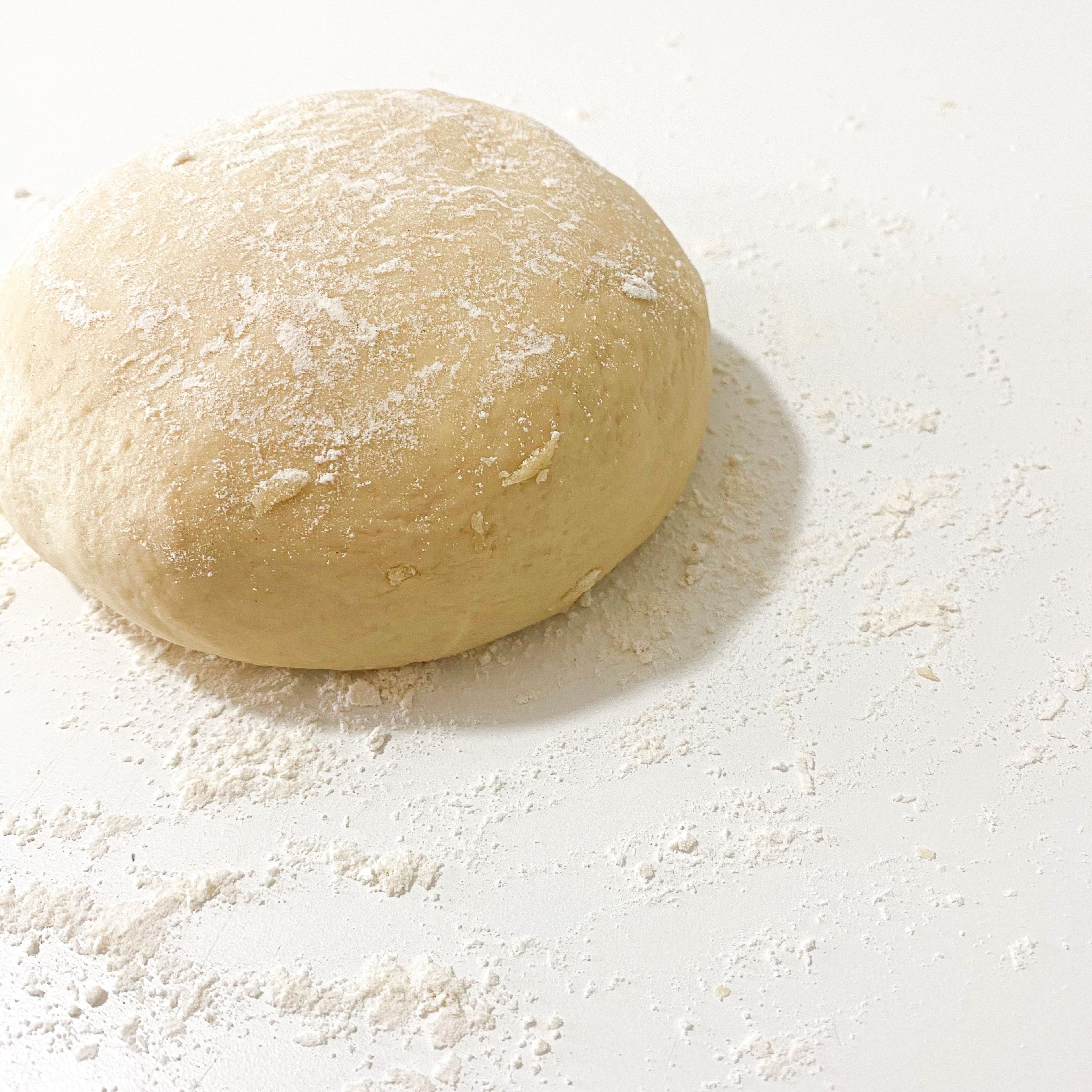 Add enough flour to make a soft dough. Knead a few times on a floured counter until smooth. Place dough in a greased bowl. Cover and let rise in a warm place until doubled.