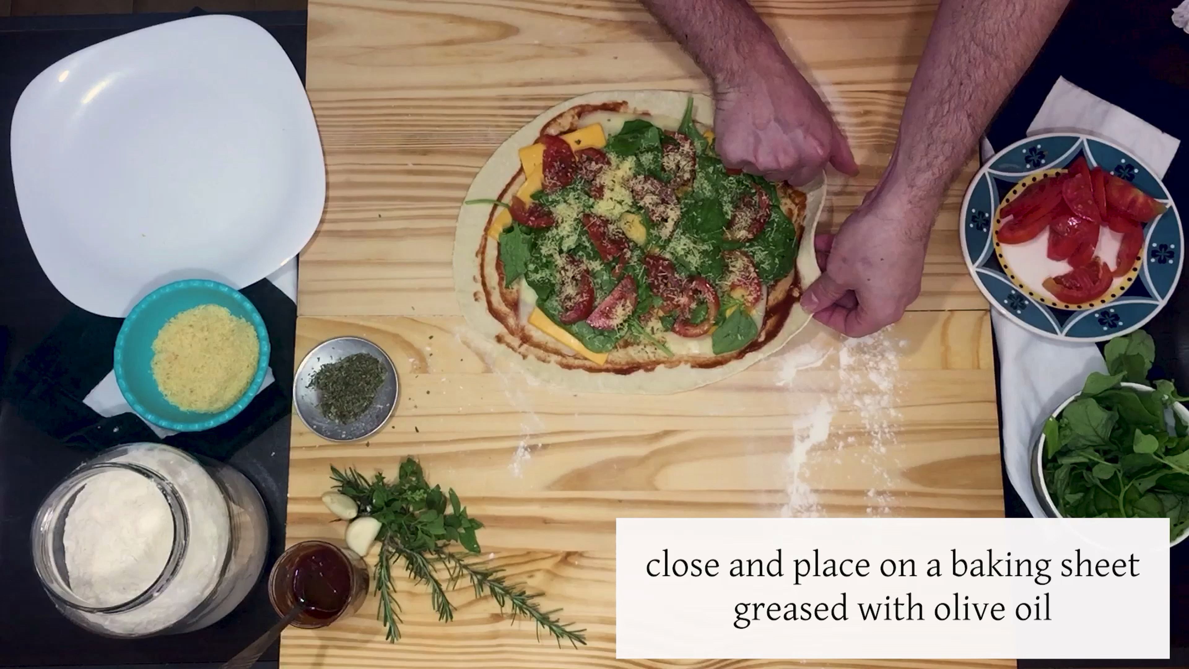 Close as shown on video; add to a greased pan with olive oil and bake at 250°C/480°F for approx. 20min