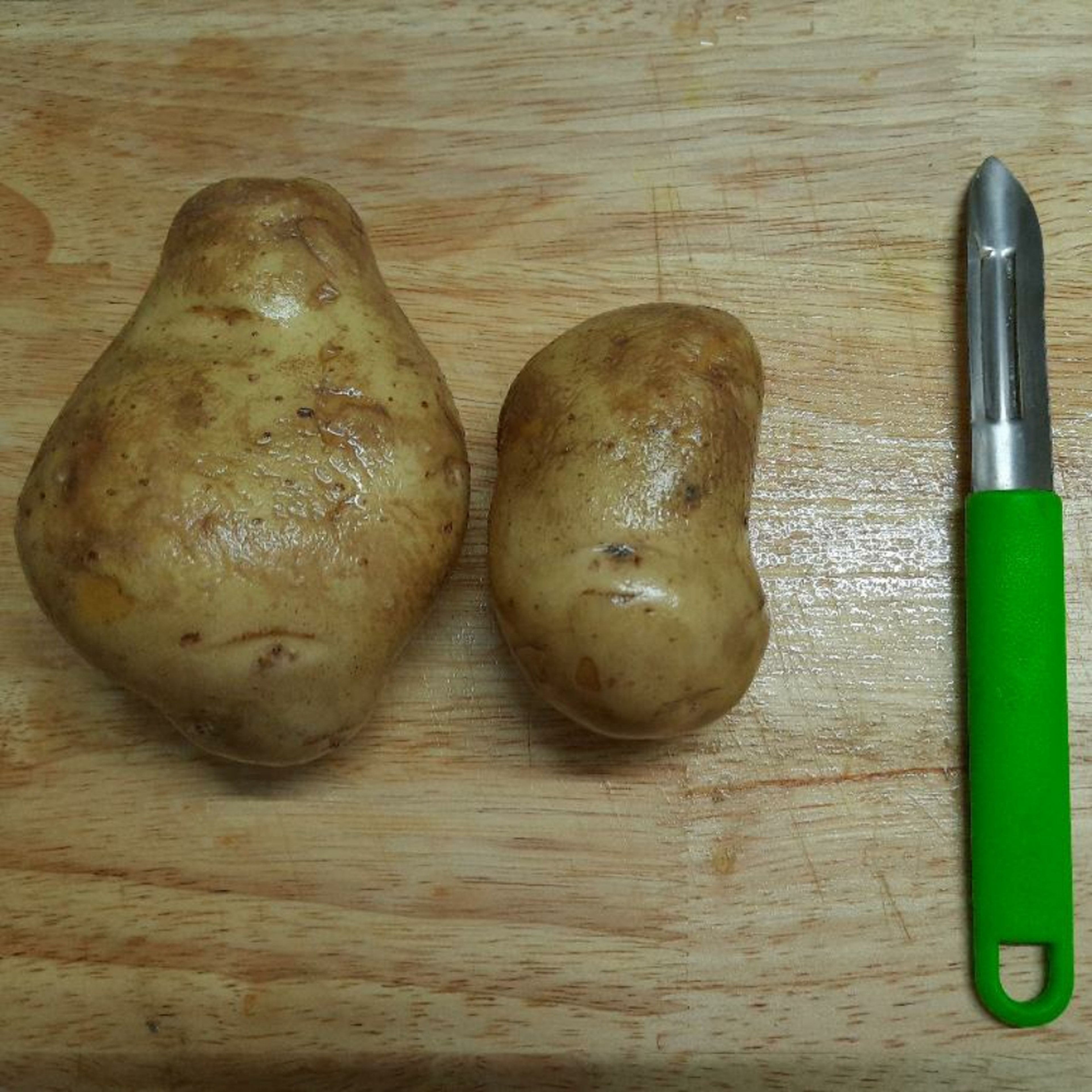 Take 2 medium sized potatoes. Wash them properly.