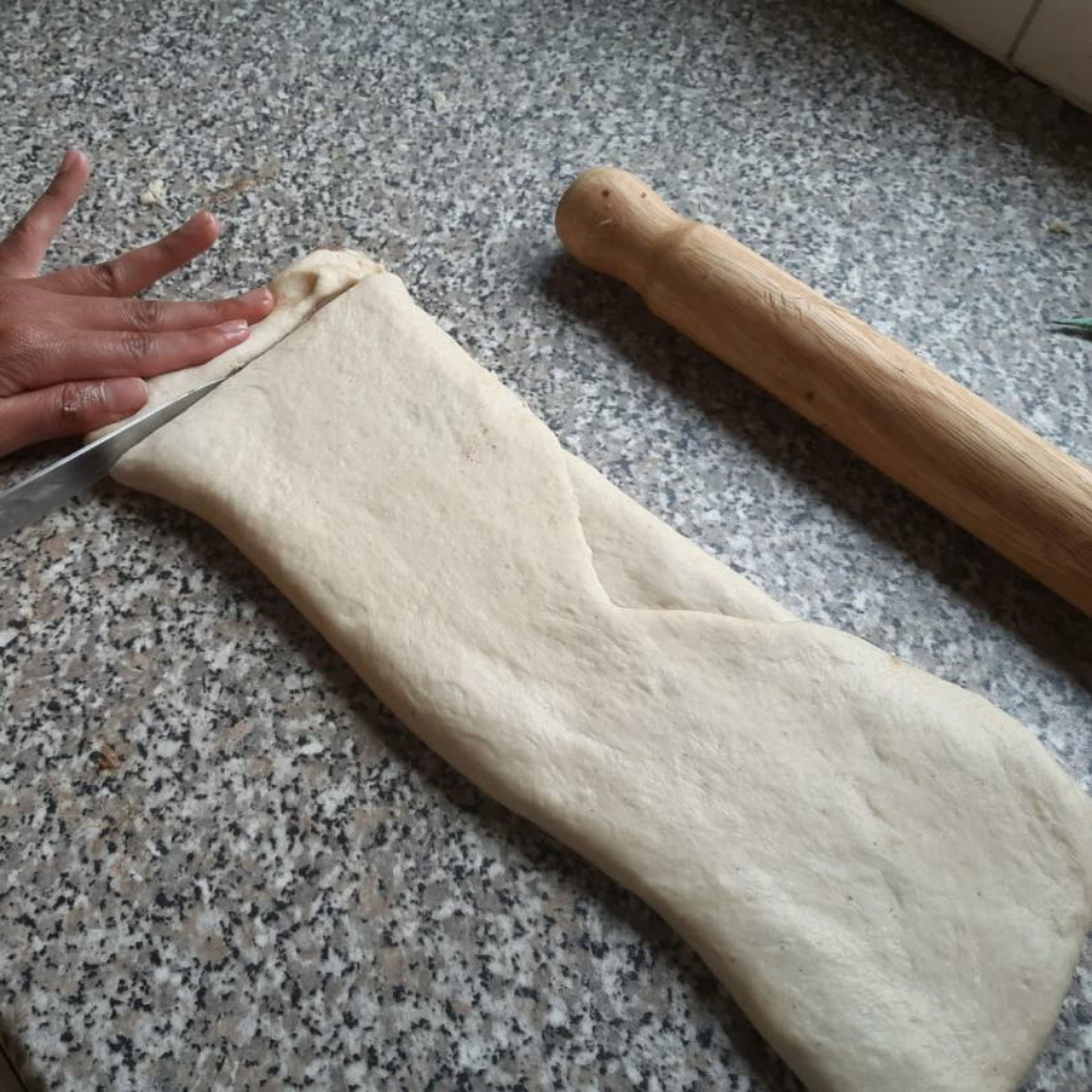 From the width of the dough, cut into strips (rough sizing: 10-15cm long and 2 cm wide)