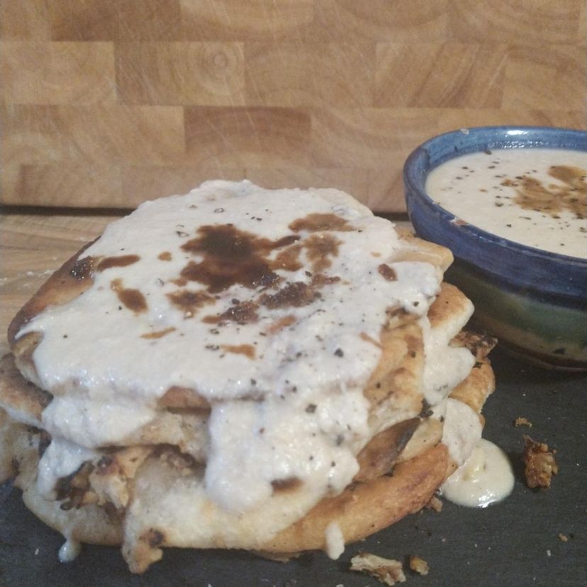 Hoisin and tofu filled dough pancakes and coconut sauce