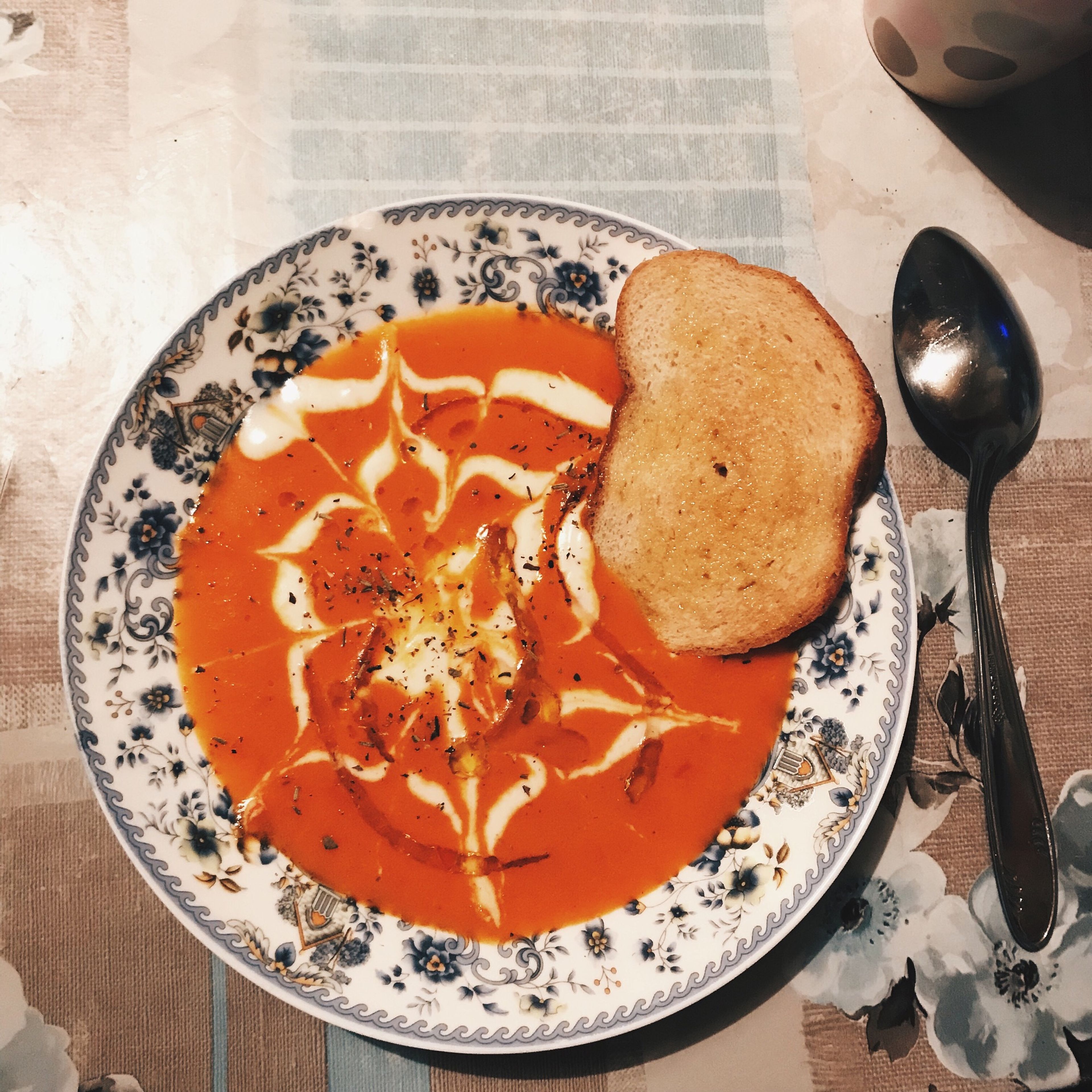 Roasted tomato soup with cilantro crema