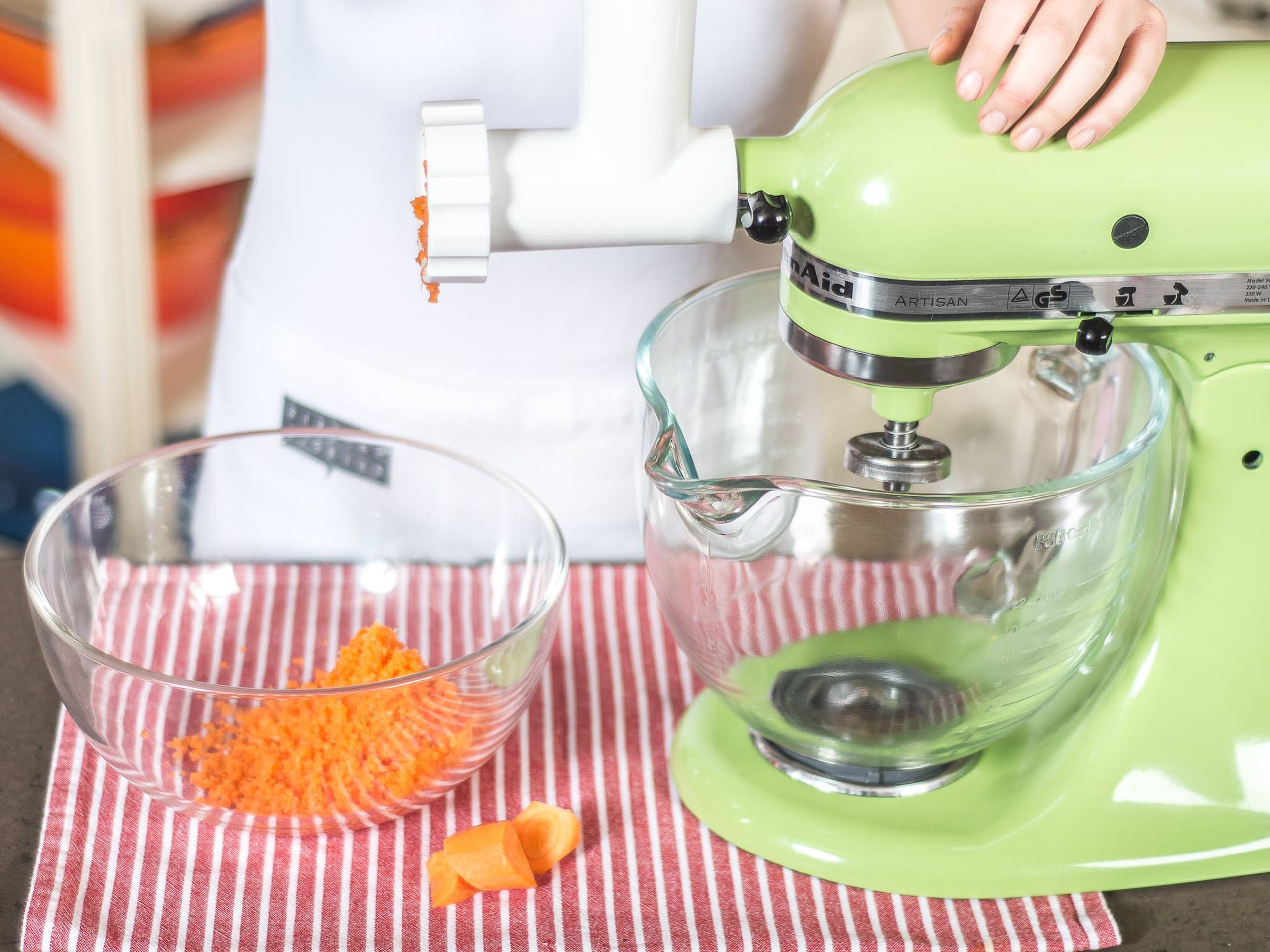 Peel the carrots, cut into walnut-sized pieces, and work into a rough paste with the food processor.