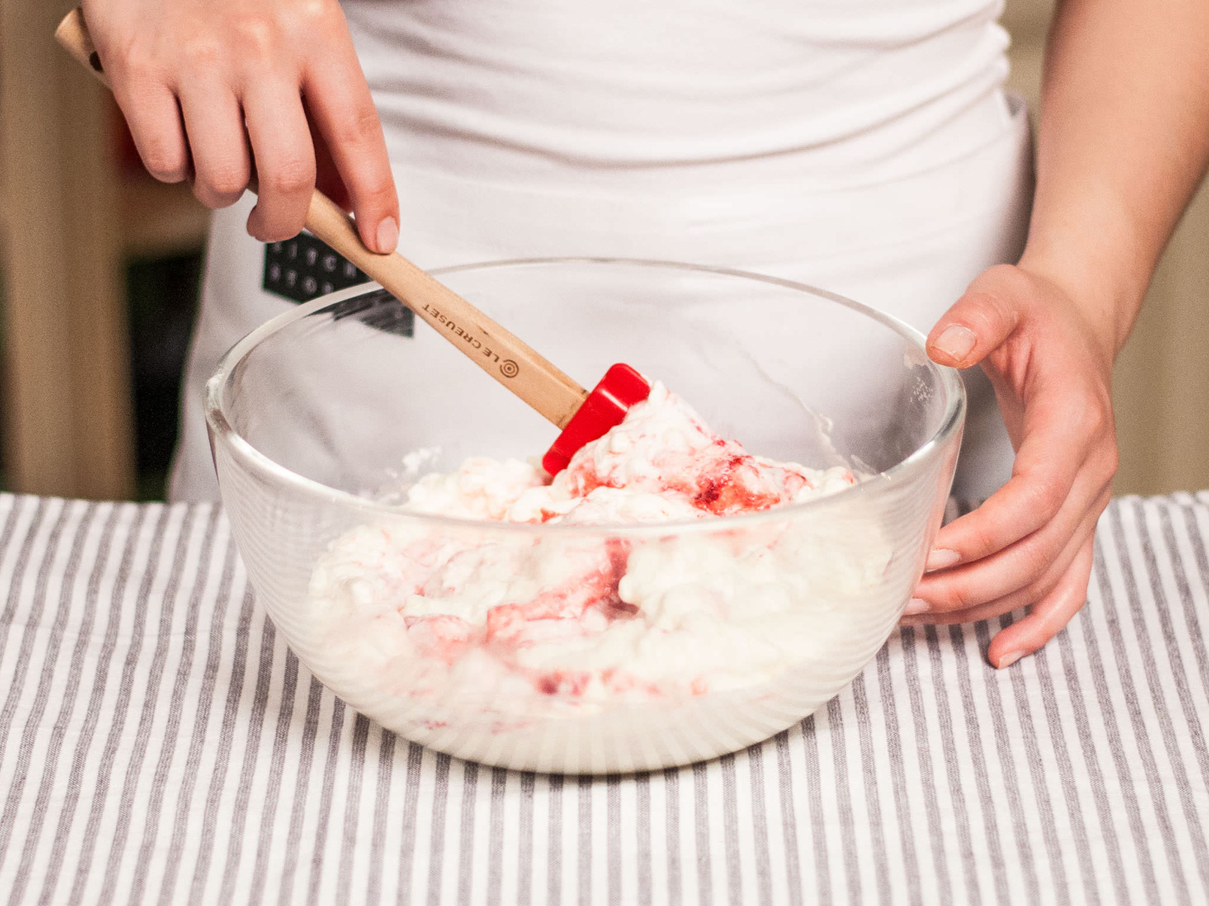 Gently fold meringue pieces and raspberry puree into whipped cream. Fill half of the cream mixture into serving dishes. Add fresh raspberries and cover with another layer of the cream mixture. Garnish with fresh mint to serve.