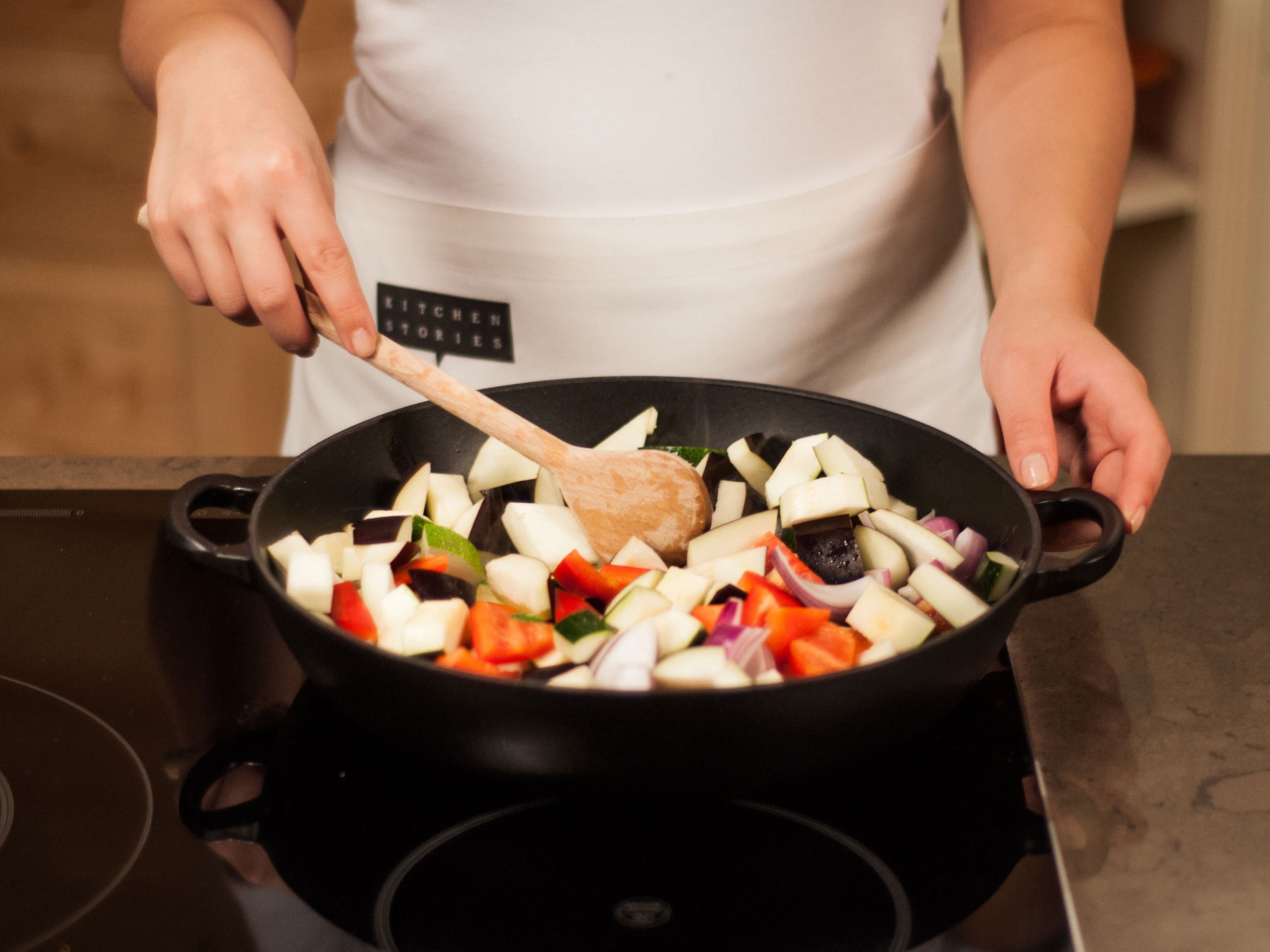 Add some olive oil to a frying pan and sauté garlic, onion, bell peppers, zucchini, and eggplant over medium-high heat for approx. 4 – 6 min.