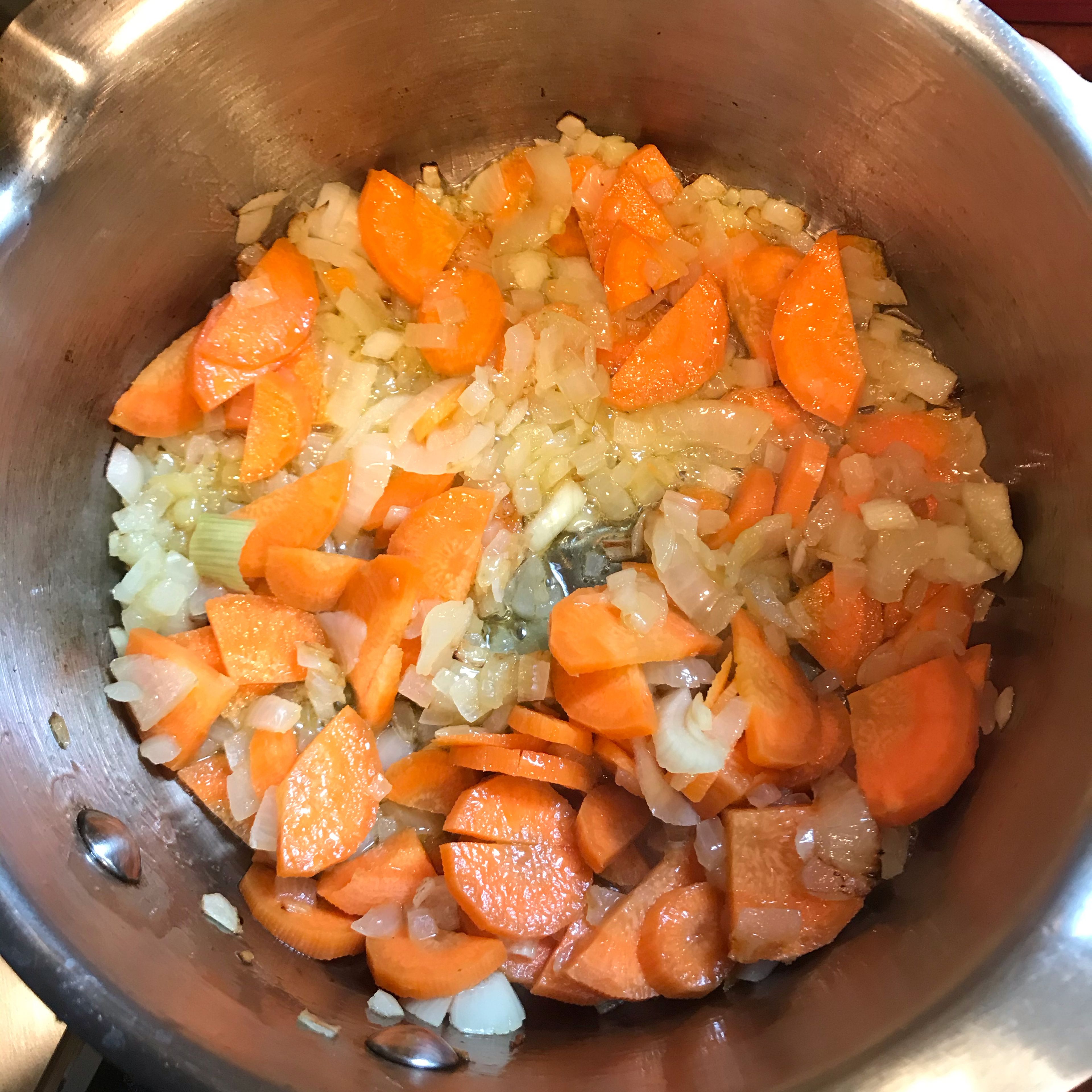 Add the chopped carrots and cook for 5 more minutes