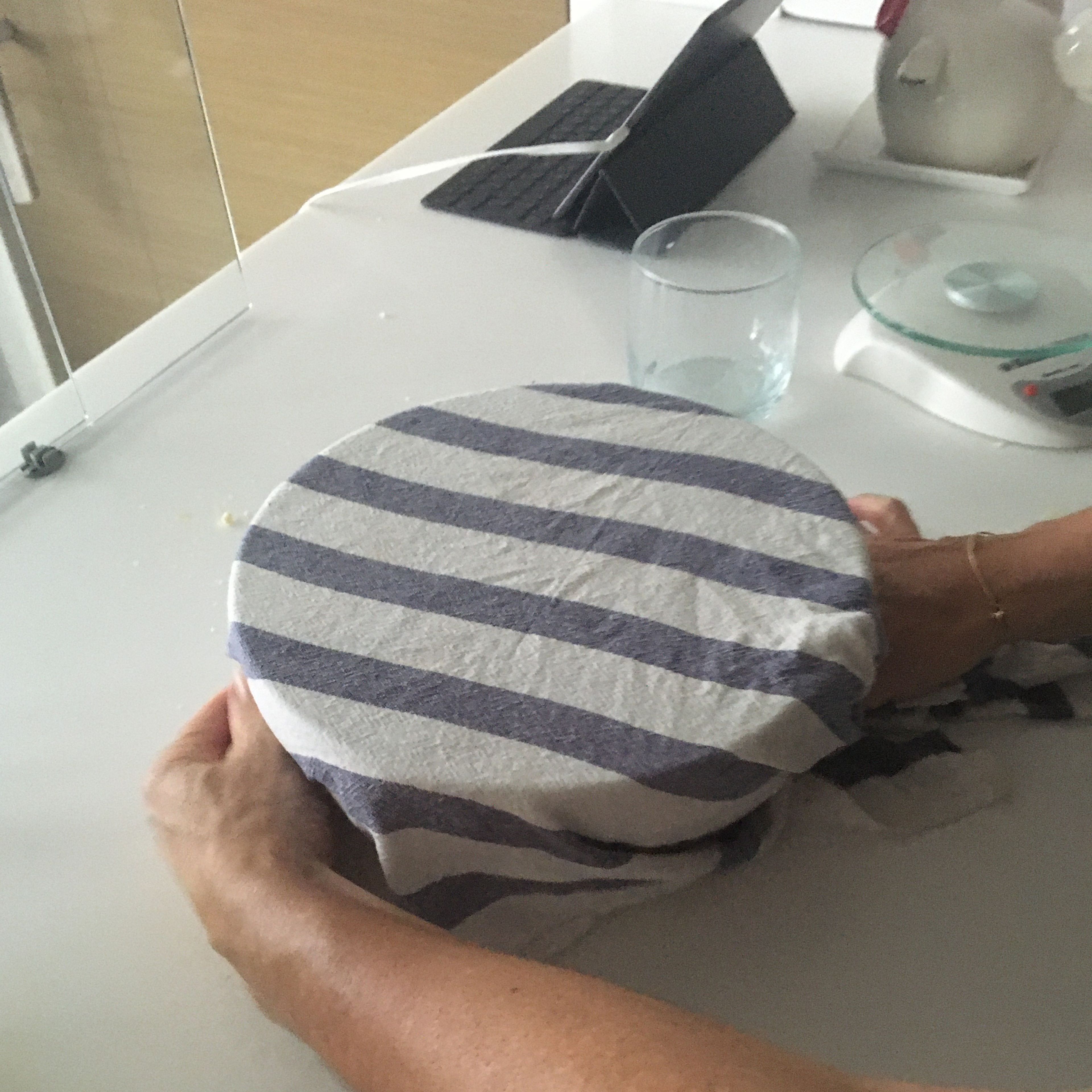 Wrap a towel around the bowl to help the rising of the yeast 