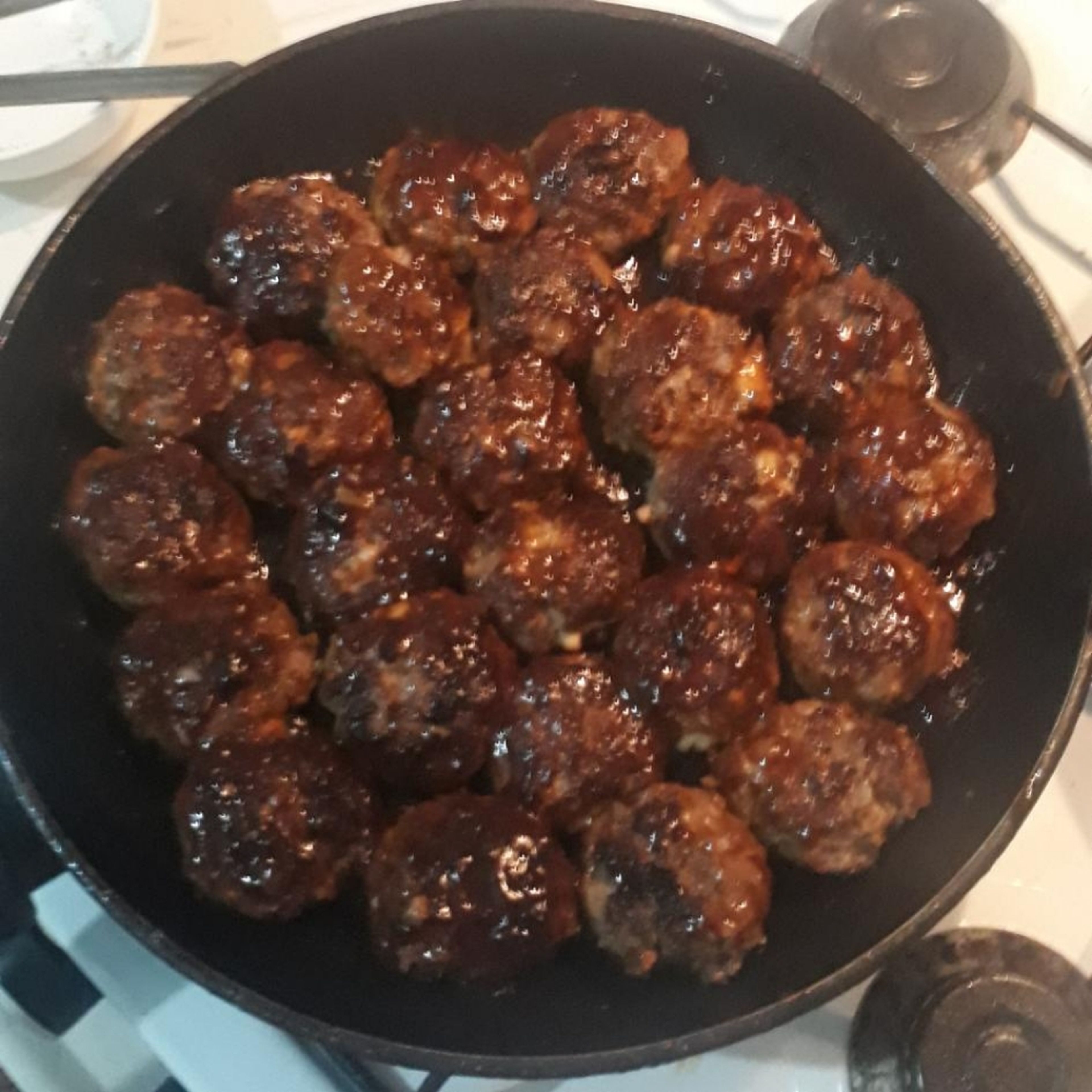 Finally turn off the oven, add meatballs and mix them.