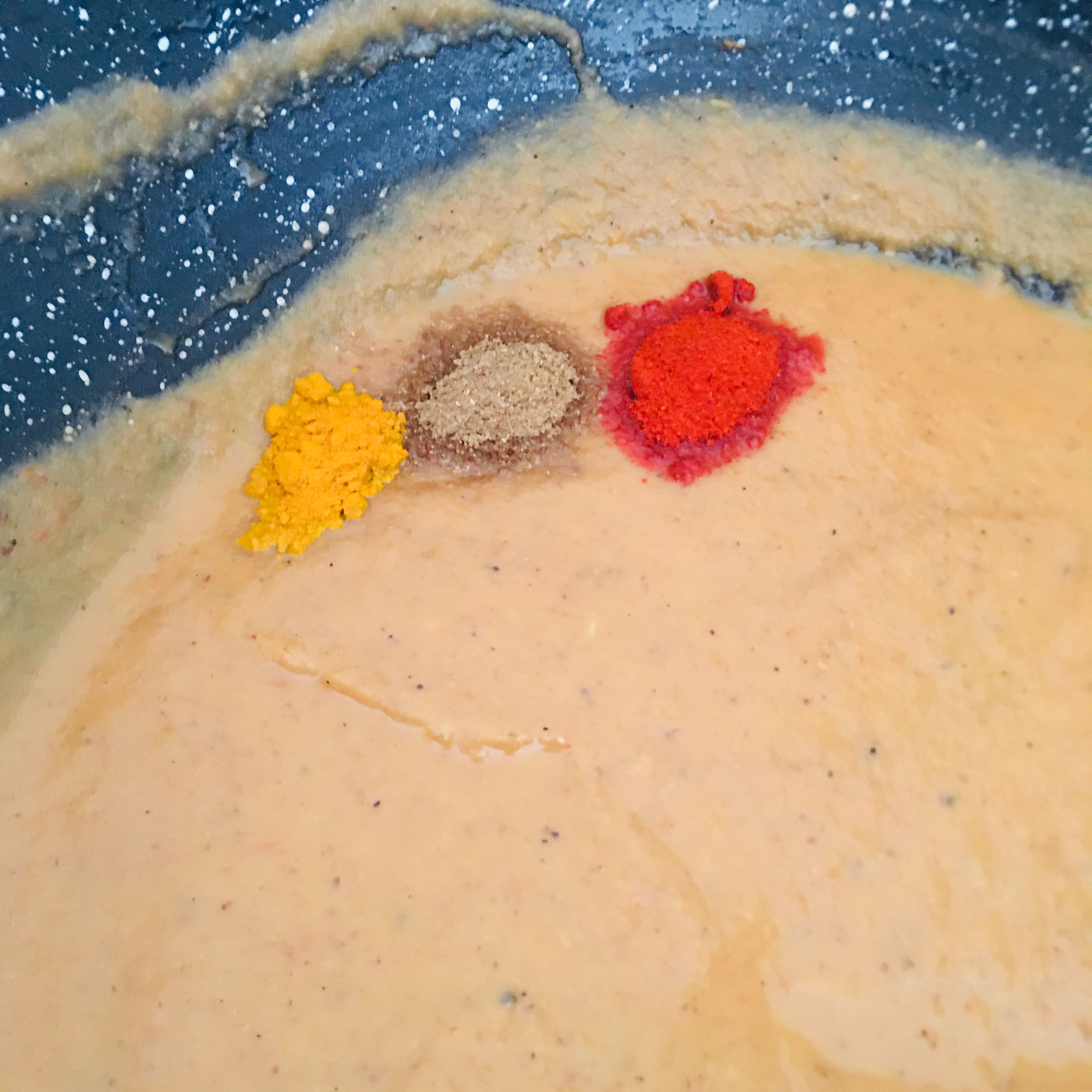 Meanwhile it’s time to spice up the blended onion tomato mixture. Add the listed spice powders to the gravy. Continue cooking the mixture for another 5 minutes.
