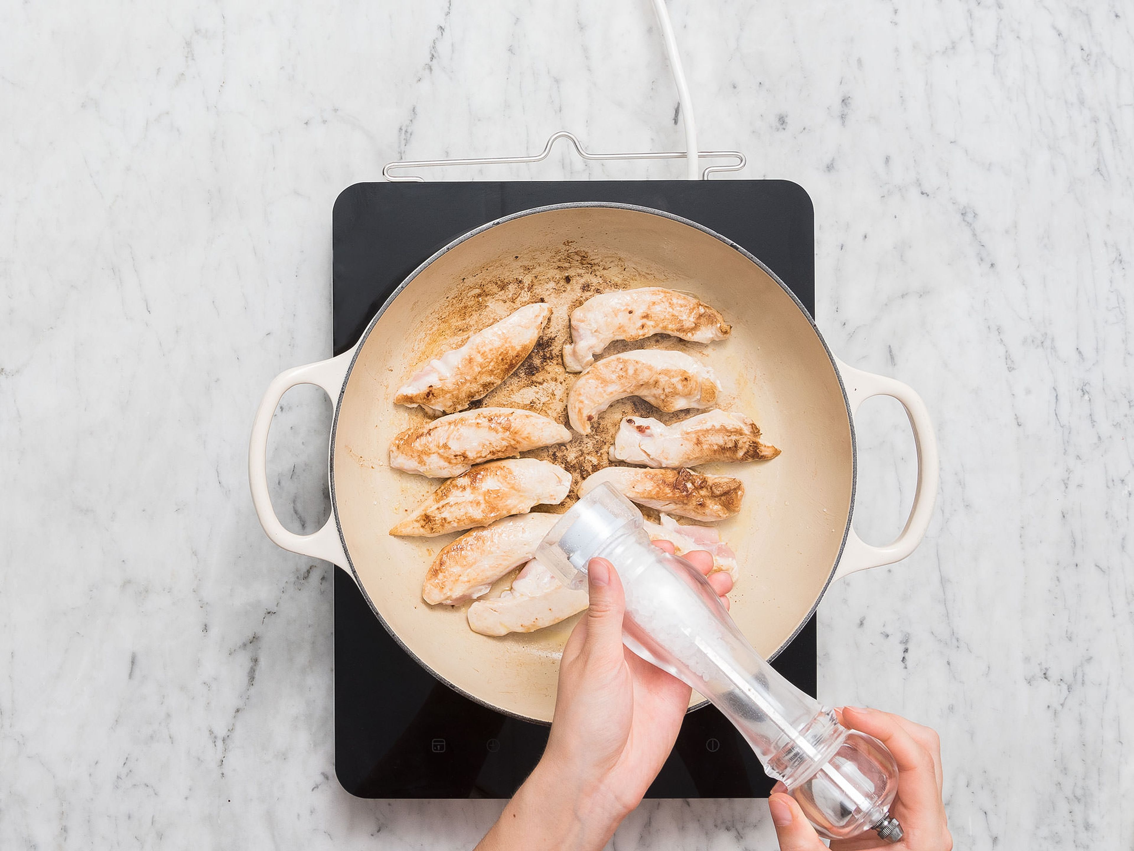 Heat oil in the same pan over medium heat. Salt chicken breast and sear on both sides for approx. 1 – 2 min. or until slightly browned. Remove from pan and set aside.