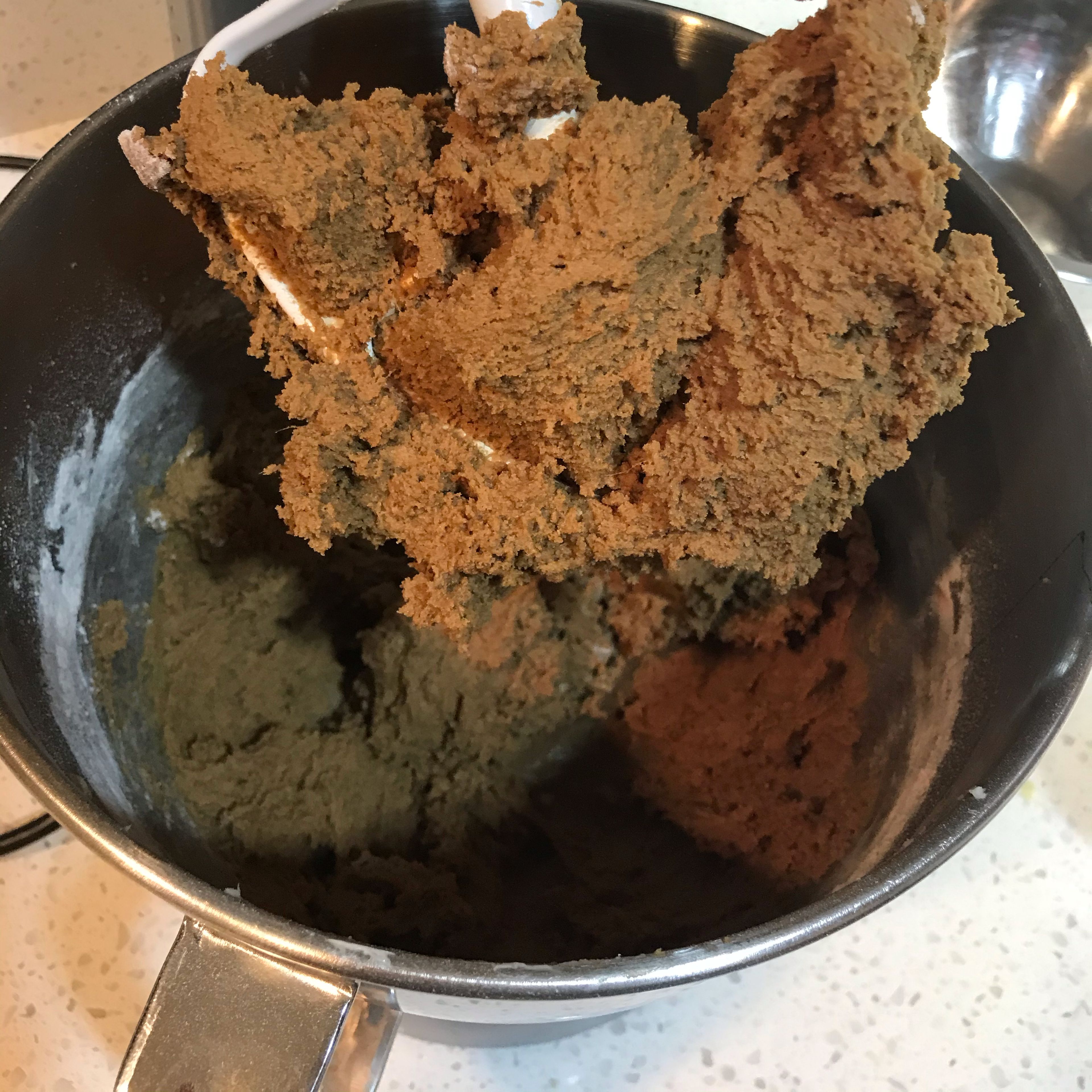 Add the flour mixture and mix on low speed until the cookie dough is well combined, no dry spots. Scrape down the sides of the bowl to combine thoroughly without over mixing.