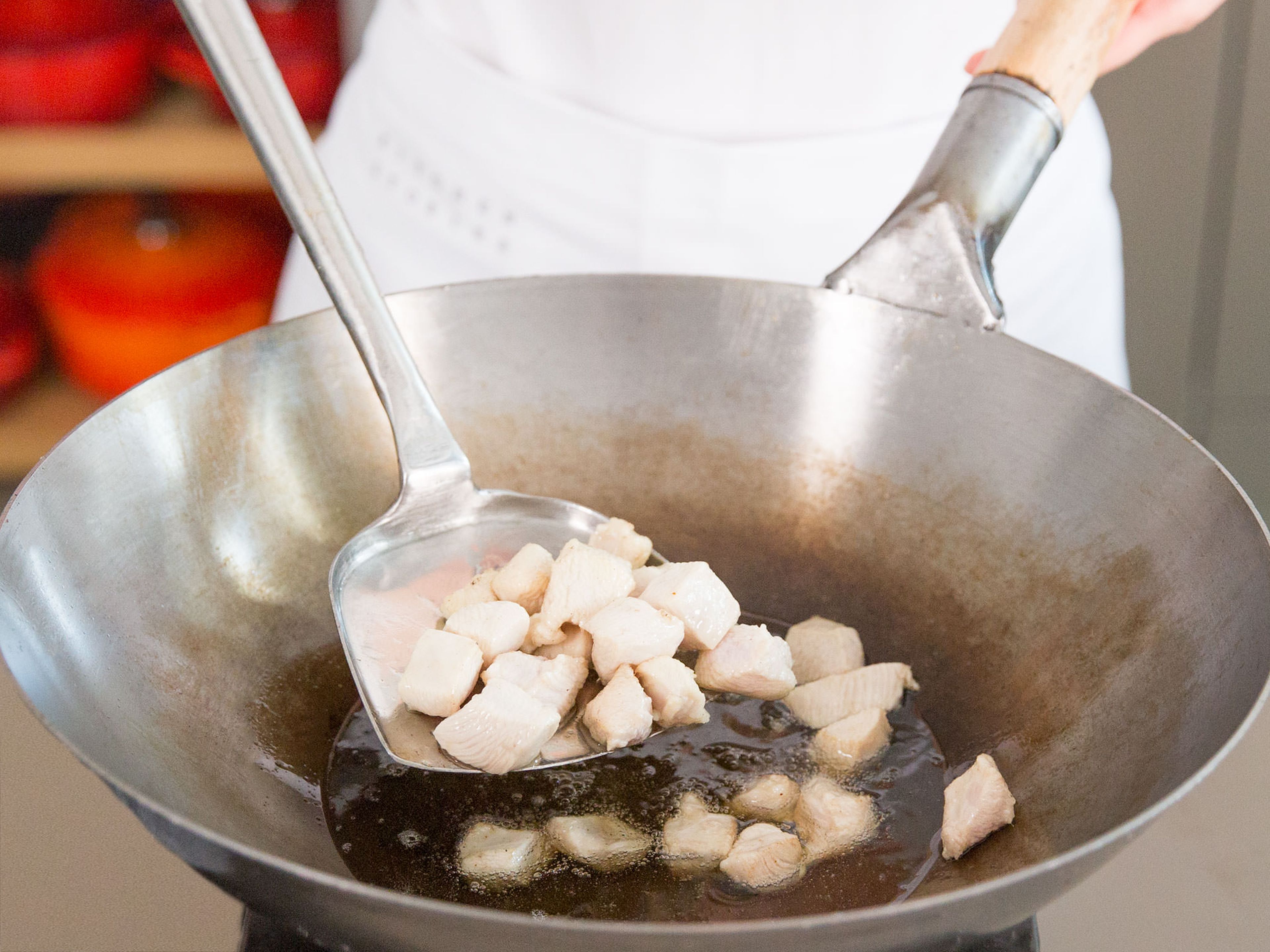 Add chicken to wok and fry for approx. 6 – 7 min., until almost cooked through. Transfer to paper towels and set aside. Make sure to keep the slurry in the bowl.