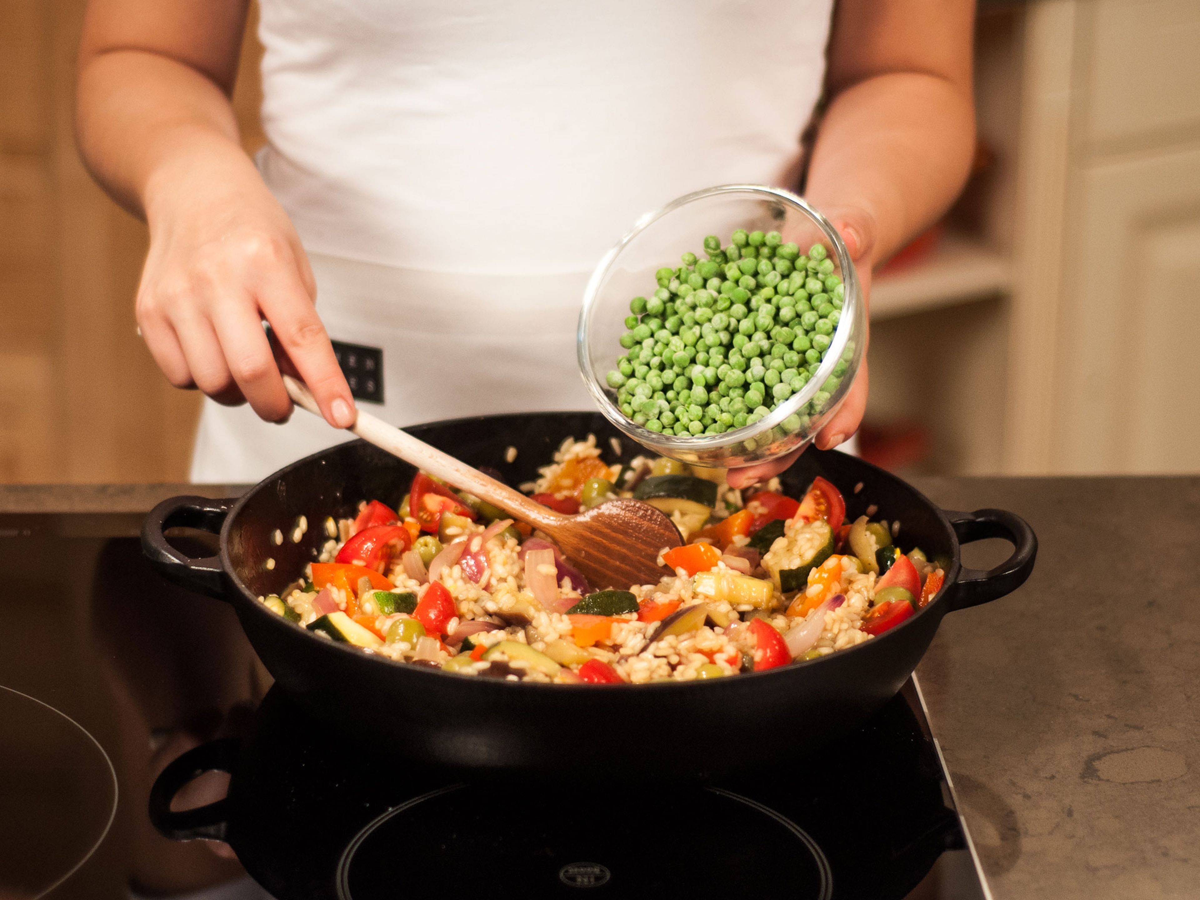 Gently fold in lemon fillets, tomatoes, olives, green onions, and peas. Continue to sauté approx. for 5 – 6 min. Enjoy!