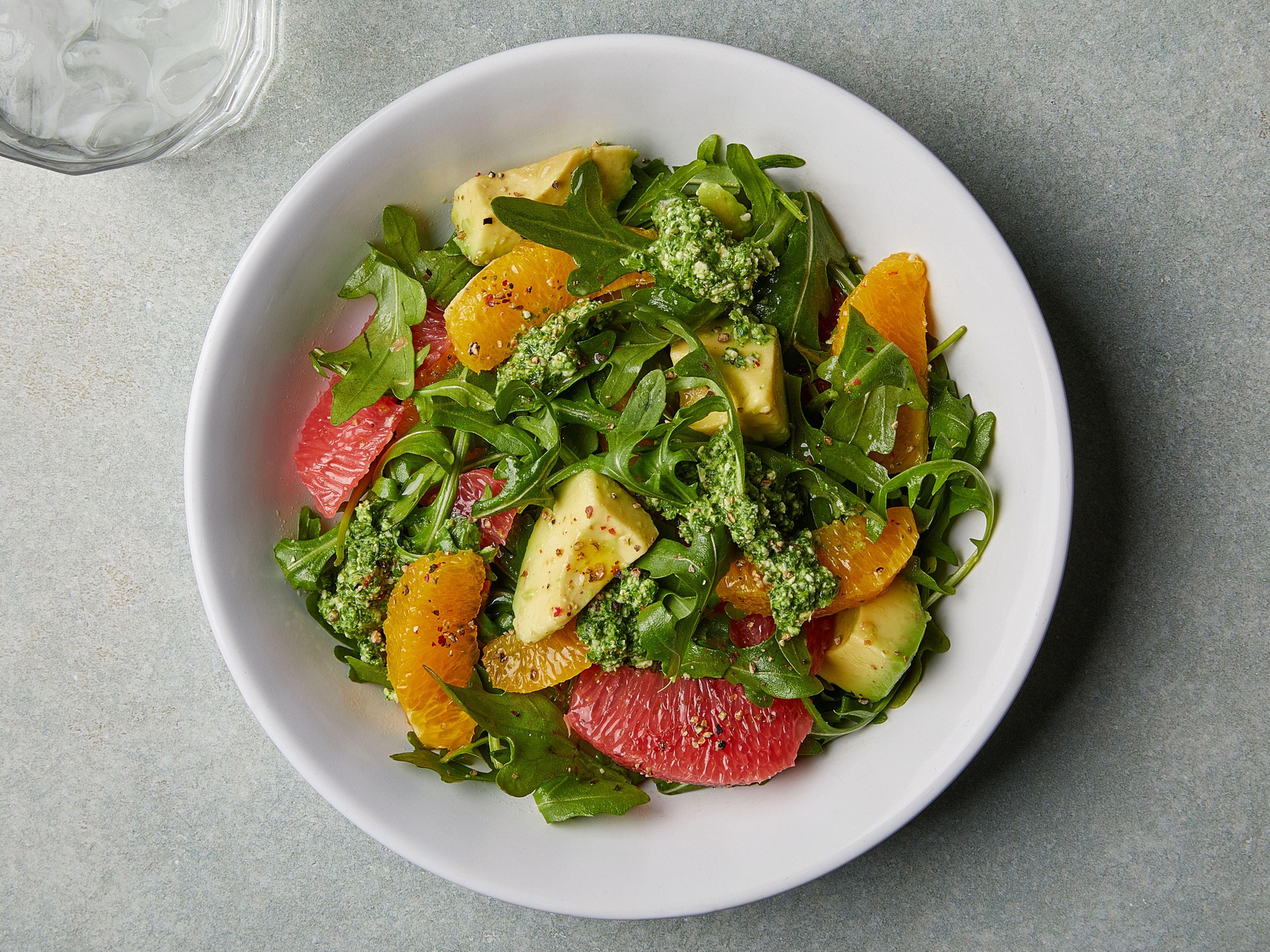 Avocado citrus salad with mixed nut pesto