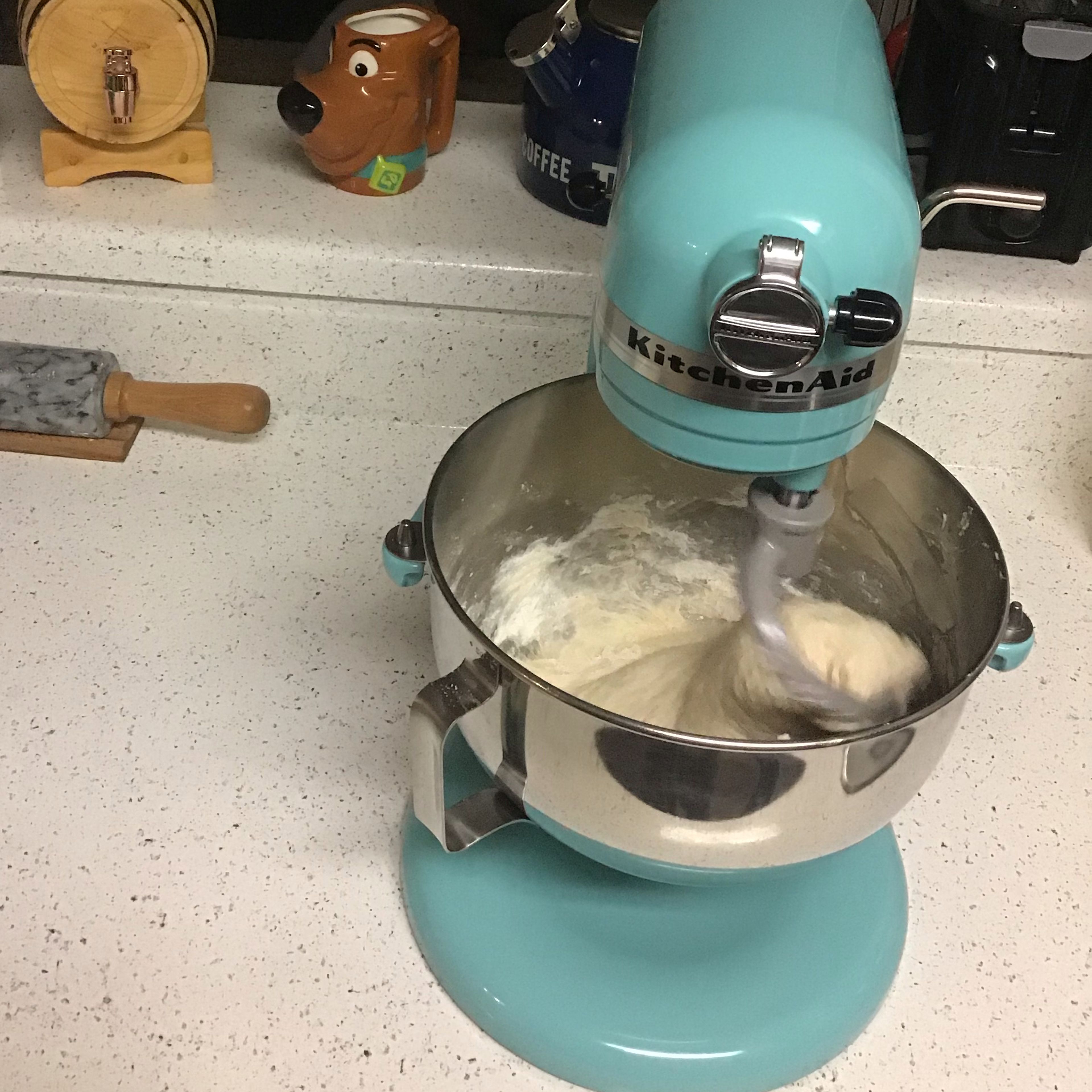 Transfer the dough to a clean counter dusted with a little of flour, and knead (with more flour if needed) until it doesn’t sticks to your hands and is very smooth. This process should take about 15 to 20 minutes. (It can be made in one stand mixer)