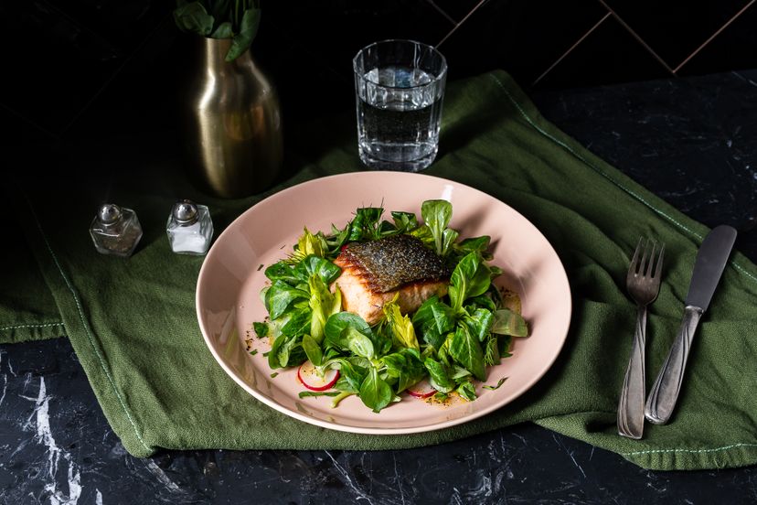 Pan fried salmon filets with lamb’s lettuce