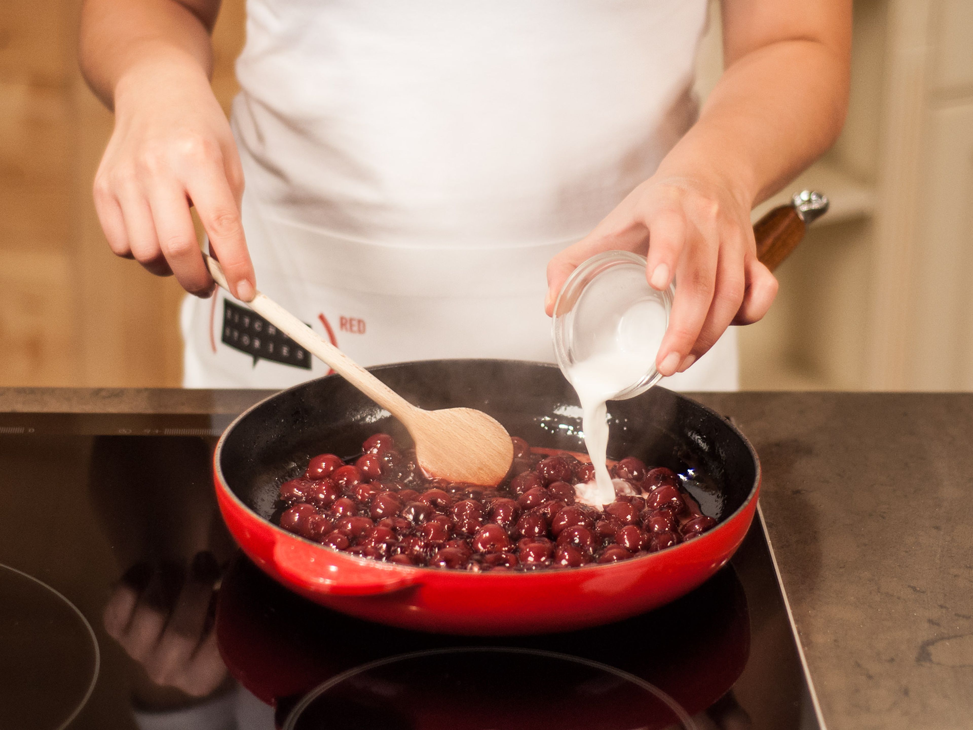 In the meantime, dissolve remaining cornstarch in some water. Add mixture to the sauce until thickened to desired consistency. Serve hot cherries on top of a piece of the cake. Add some confectioner’s sugar to liking.