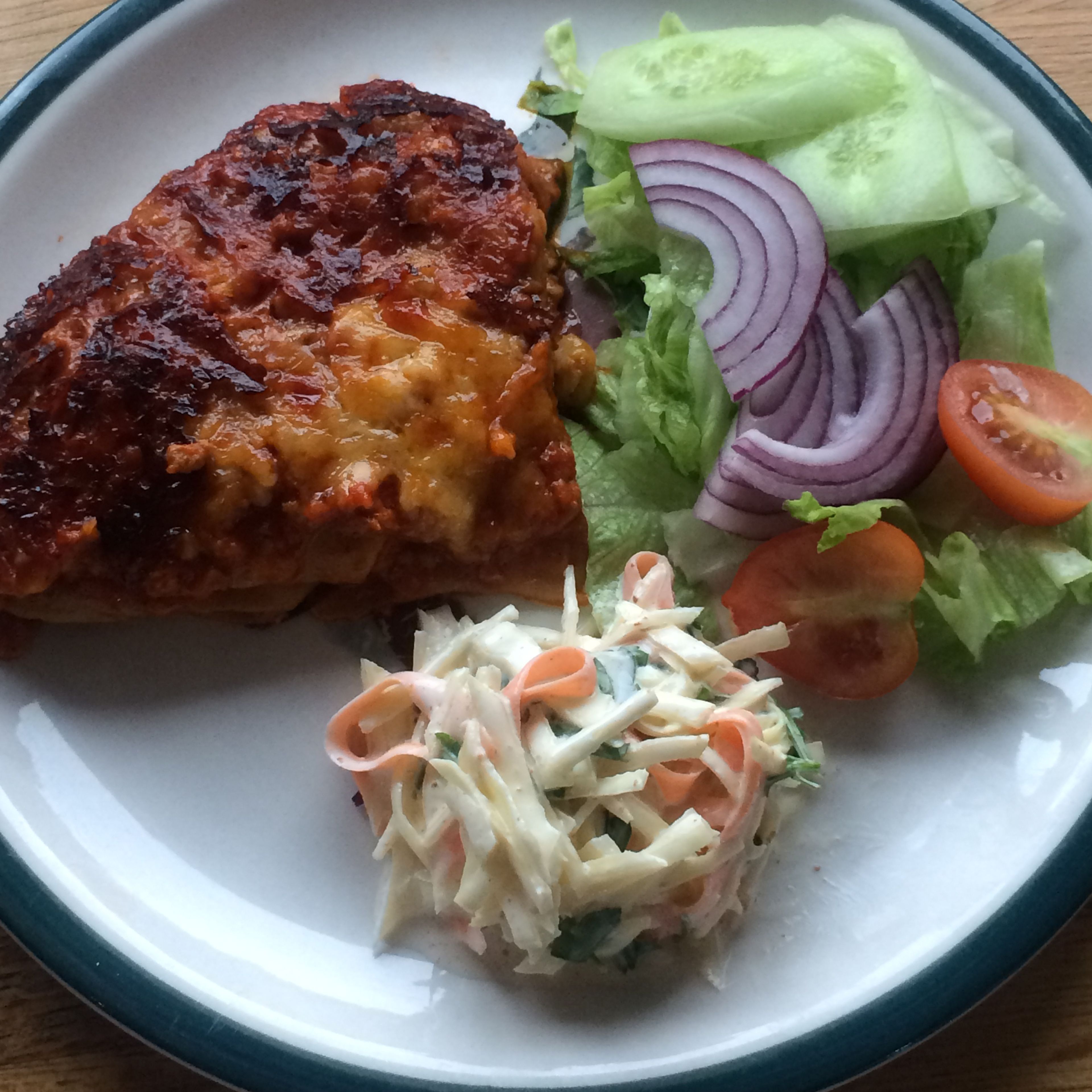 Serve lasagne with side salad and homemade coleslaw. Scrunch the cabbage and ribbons of carrot together to break them down with the salt and sugar. Set this aside for a minute before dressing with the mayonnaise, lemon juice and ground flaxseeds