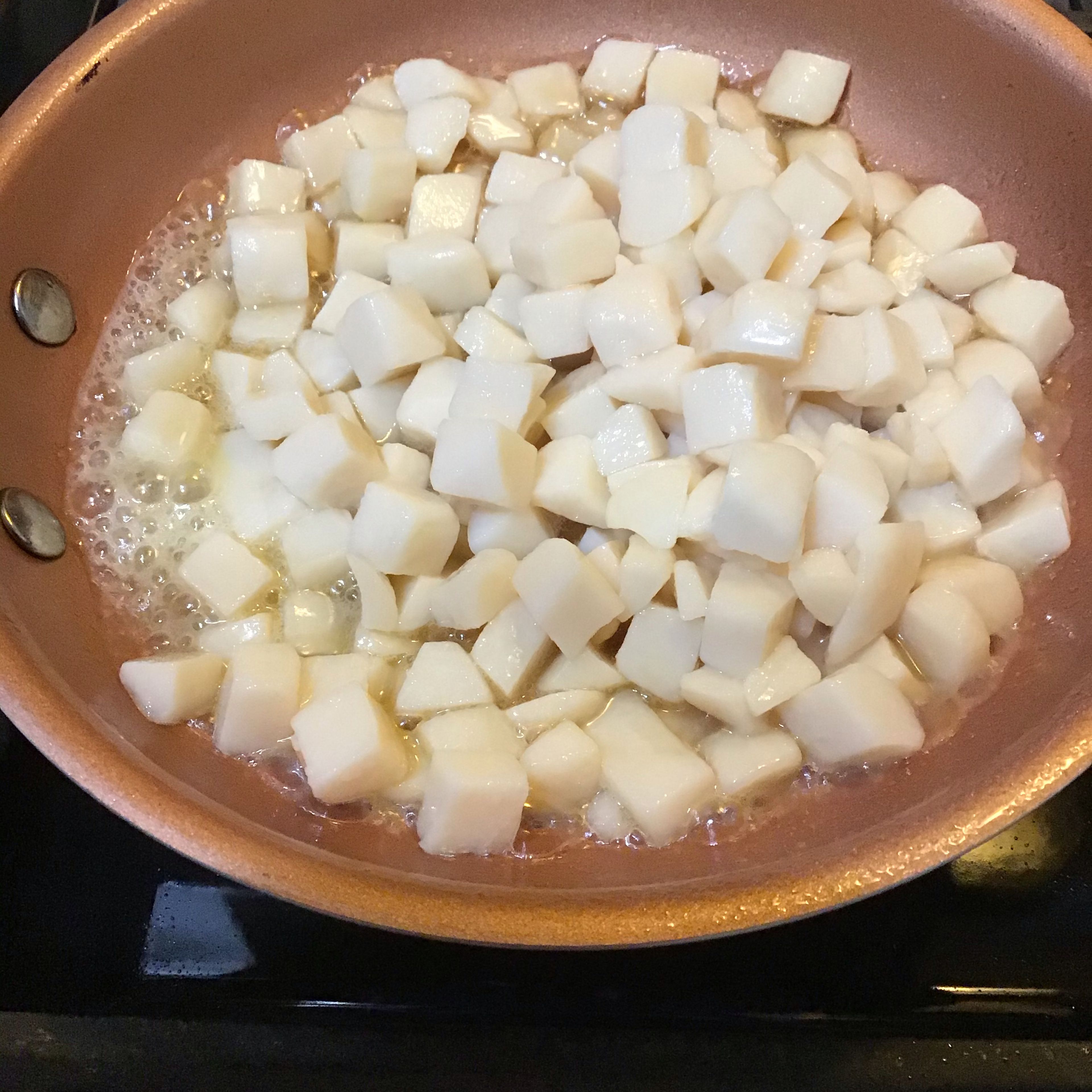 Add dices potatoes, 1 can. If you use fresh potatoes make sure to boil cubed potatoes until soften then put in frying pan.
