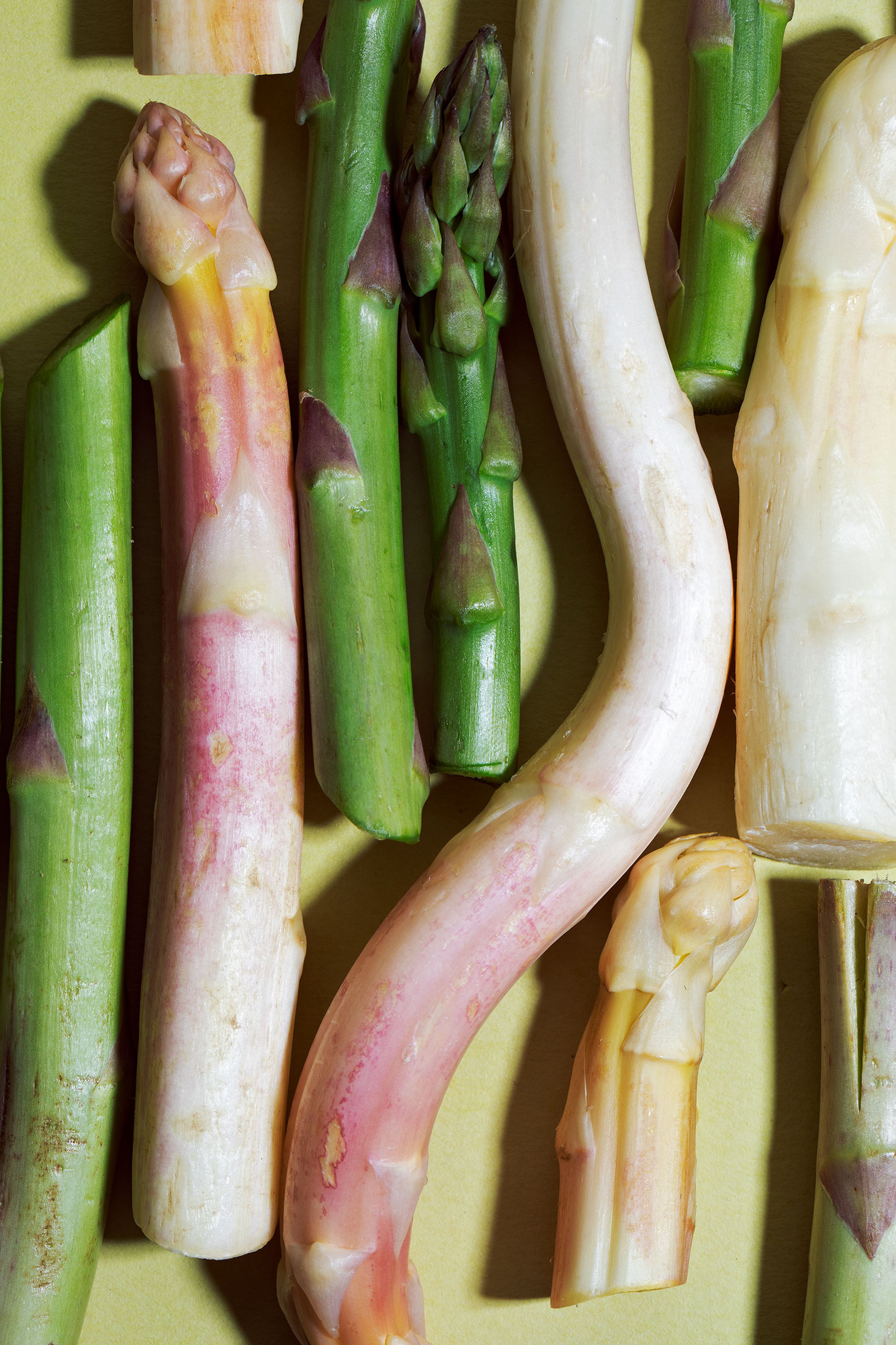 Top view, fresh tasty white asparagus, seasonal vegetable, new harvest,  with piller and knife, ready to cook, Stock Photo