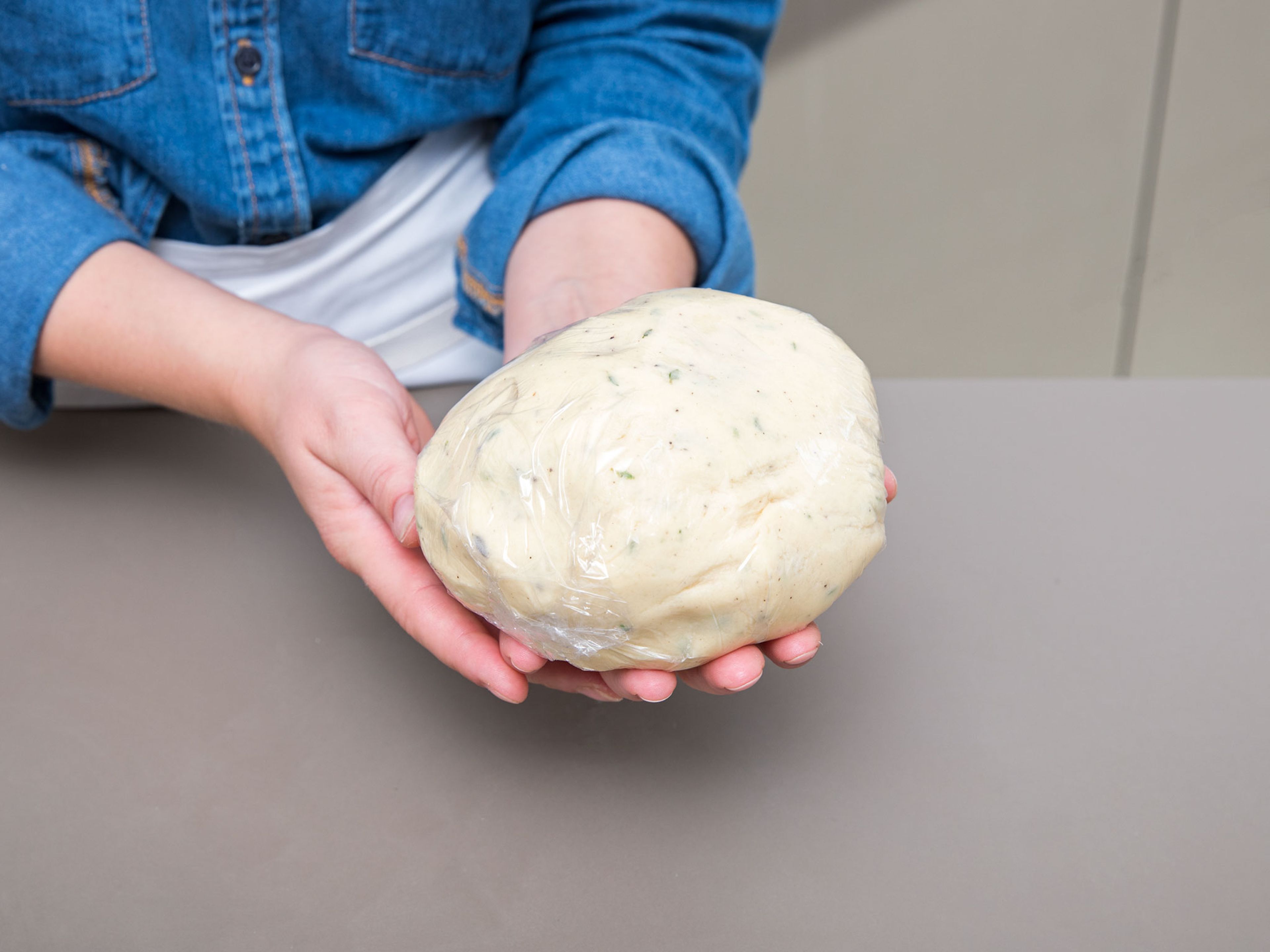 Knead the dough with your hands until smooth, then wrap the dough in plastic wrap and refrigerate for approx. 30 min.