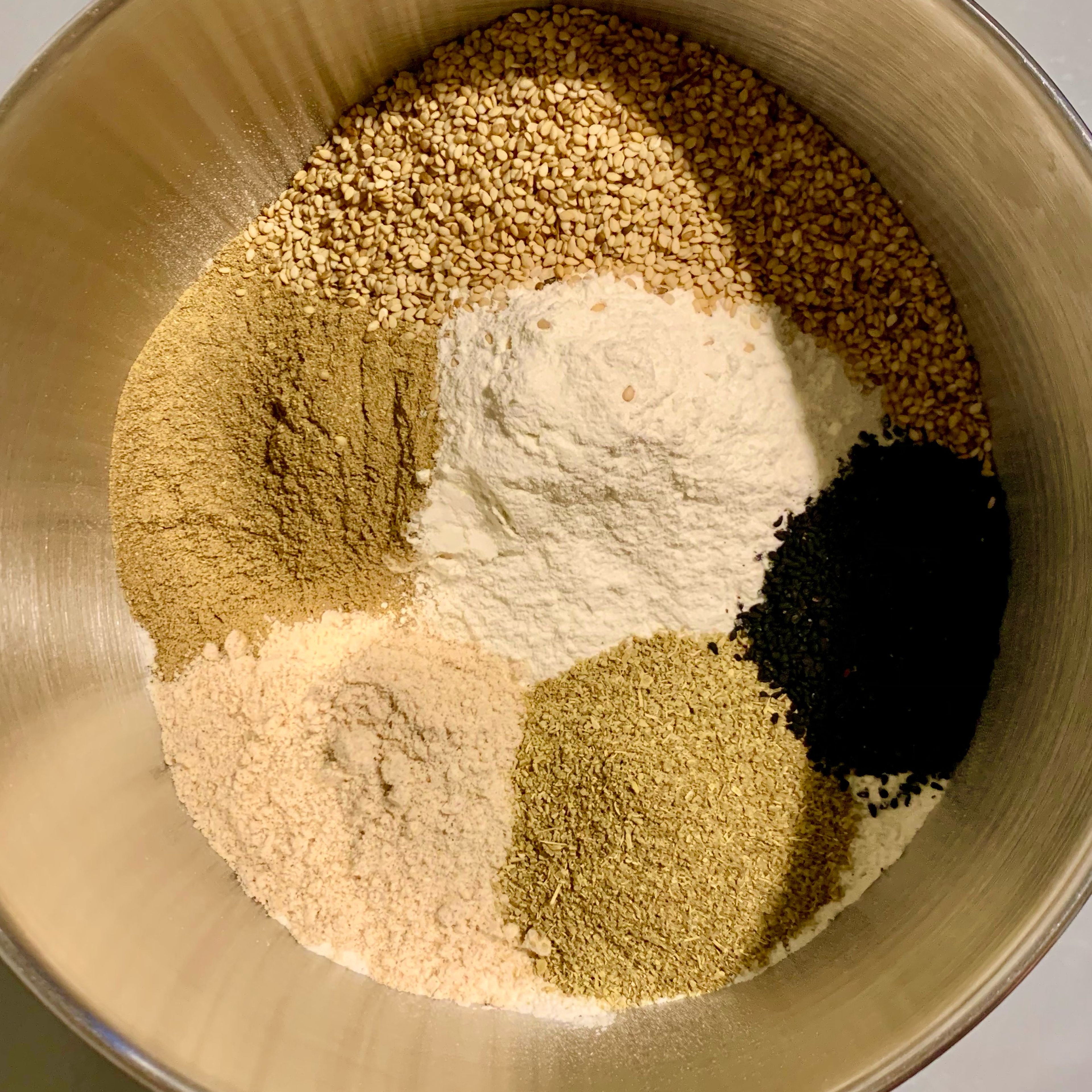 Mix all the dry ingredients together except the sugar and yeast.