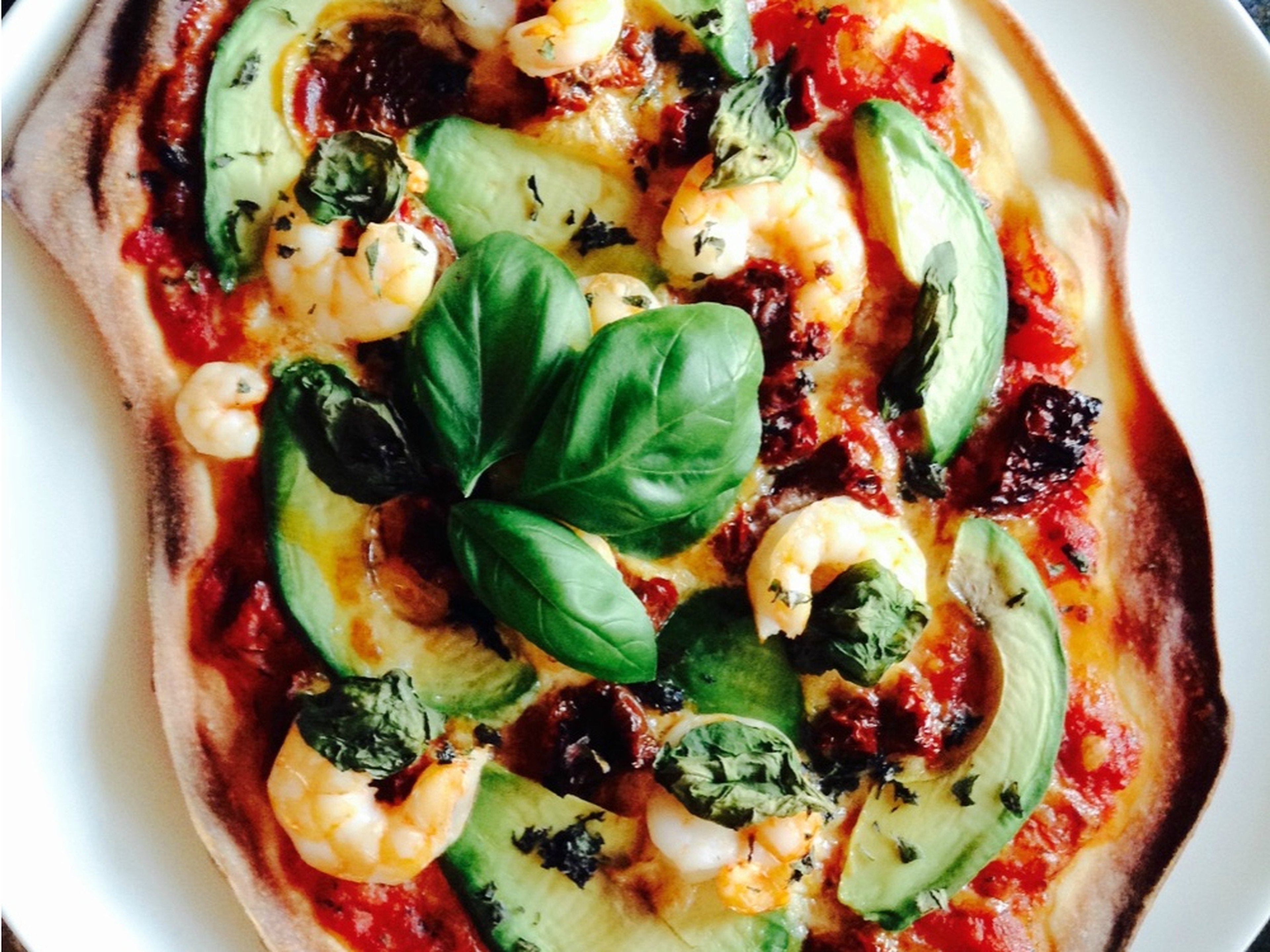 Avocado and shrimp pizza