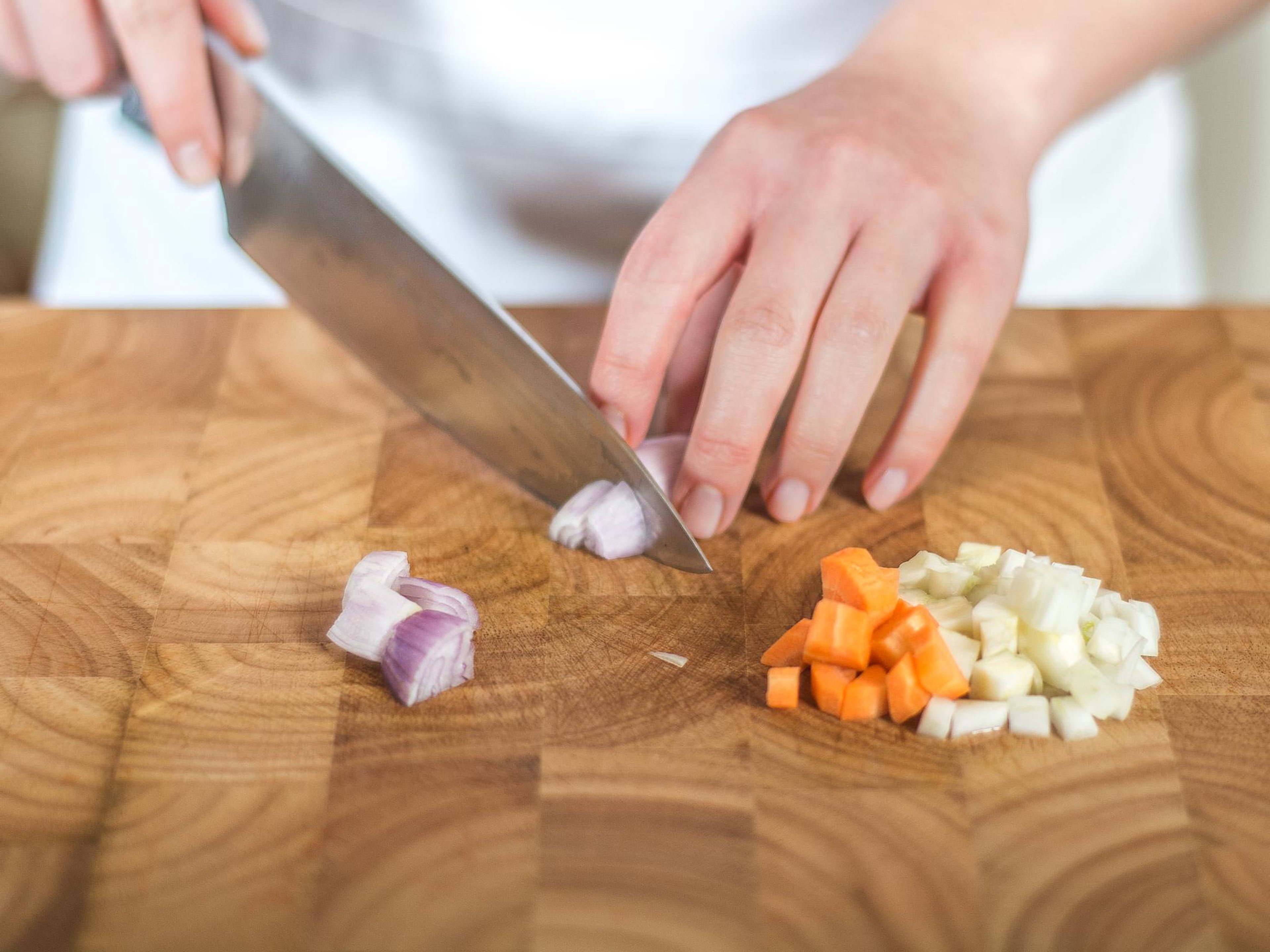 Peel, crush, and roughly chop the garlic cloves. Finely dice the fennel, carrots, and shallots.